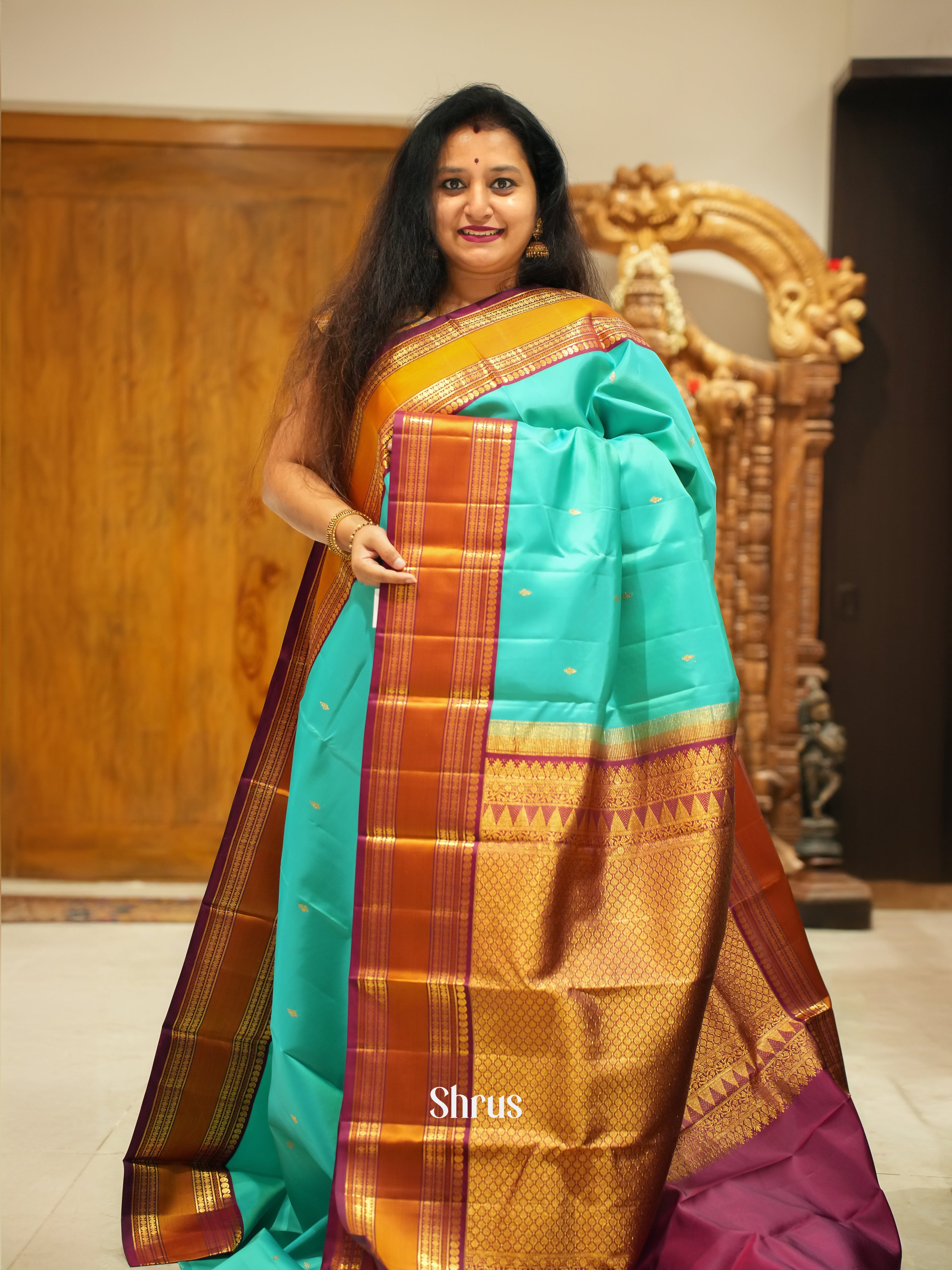 Blue And Maroon Korvai Kanchipuram silk saree With Zari Woven Floral Buttas-1