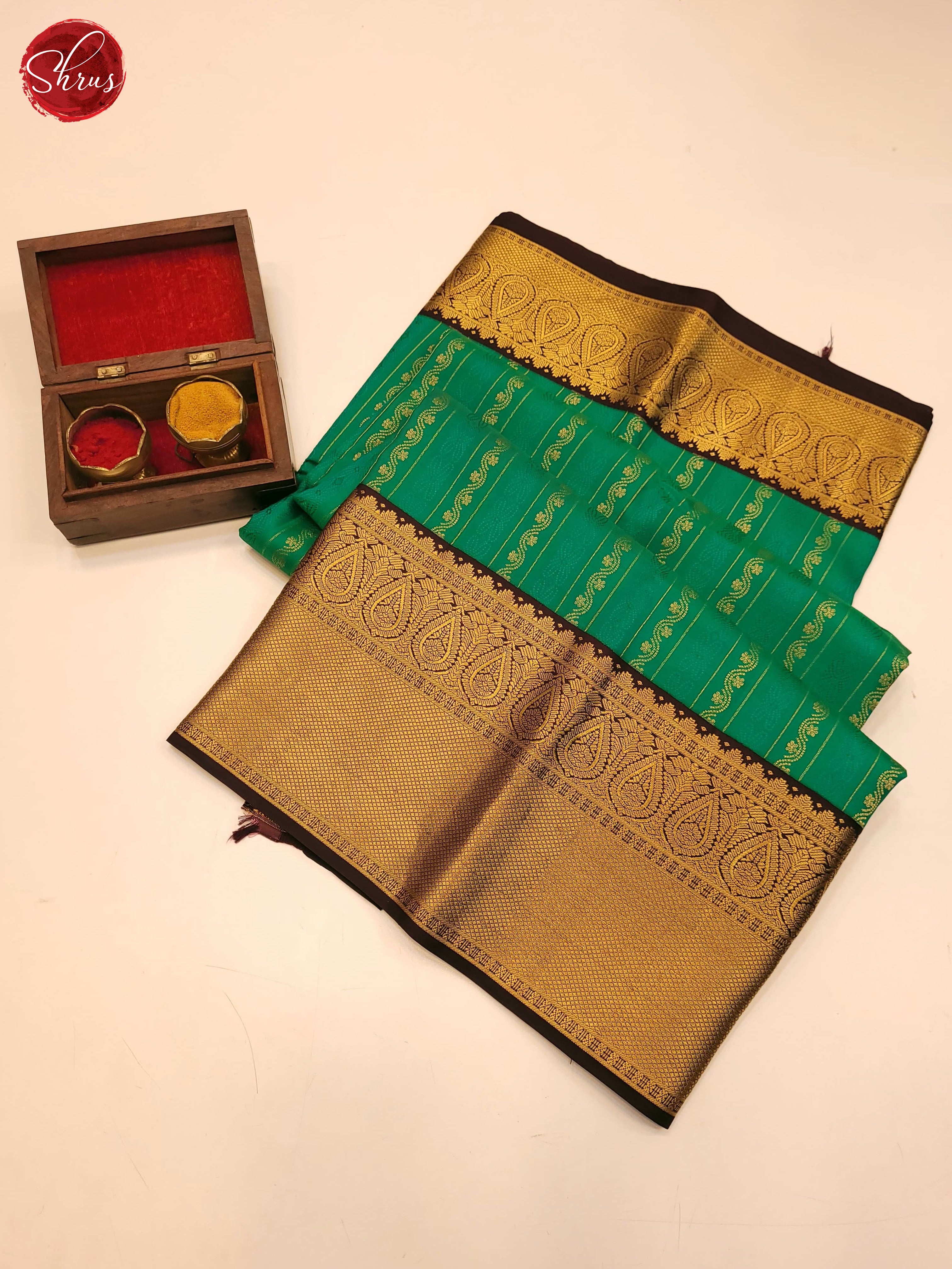 Green and brown Korvai Kanchipuram silk saree with delicate zari stripes and subtle floral motifs-1