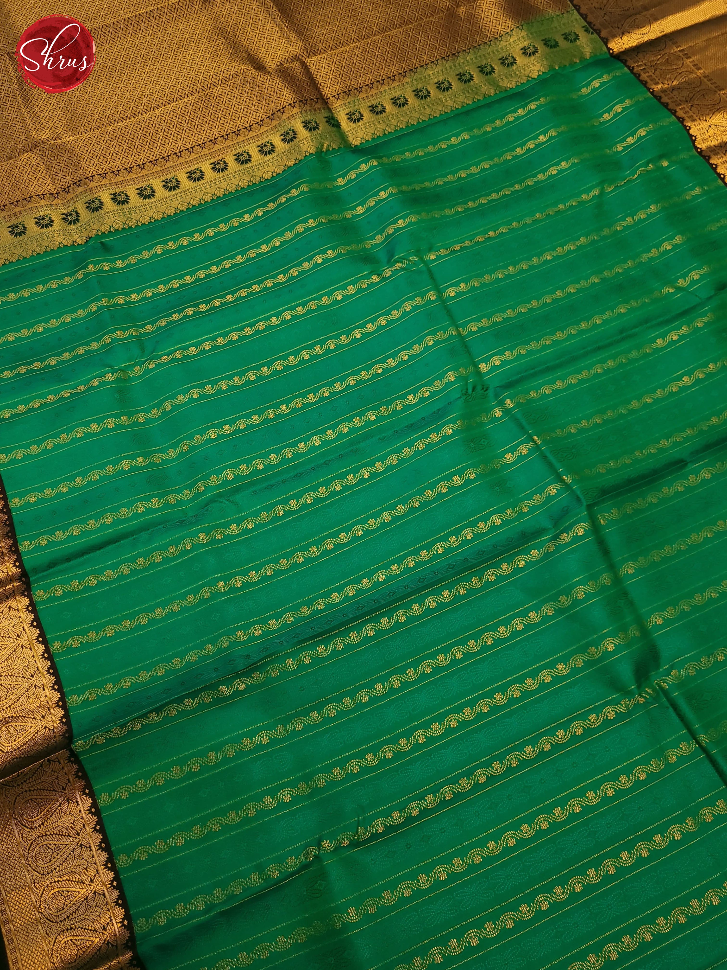 Green and brown Korvai Kanchipuram silk saree with delicate zari stripes and subtle floral motifs-3