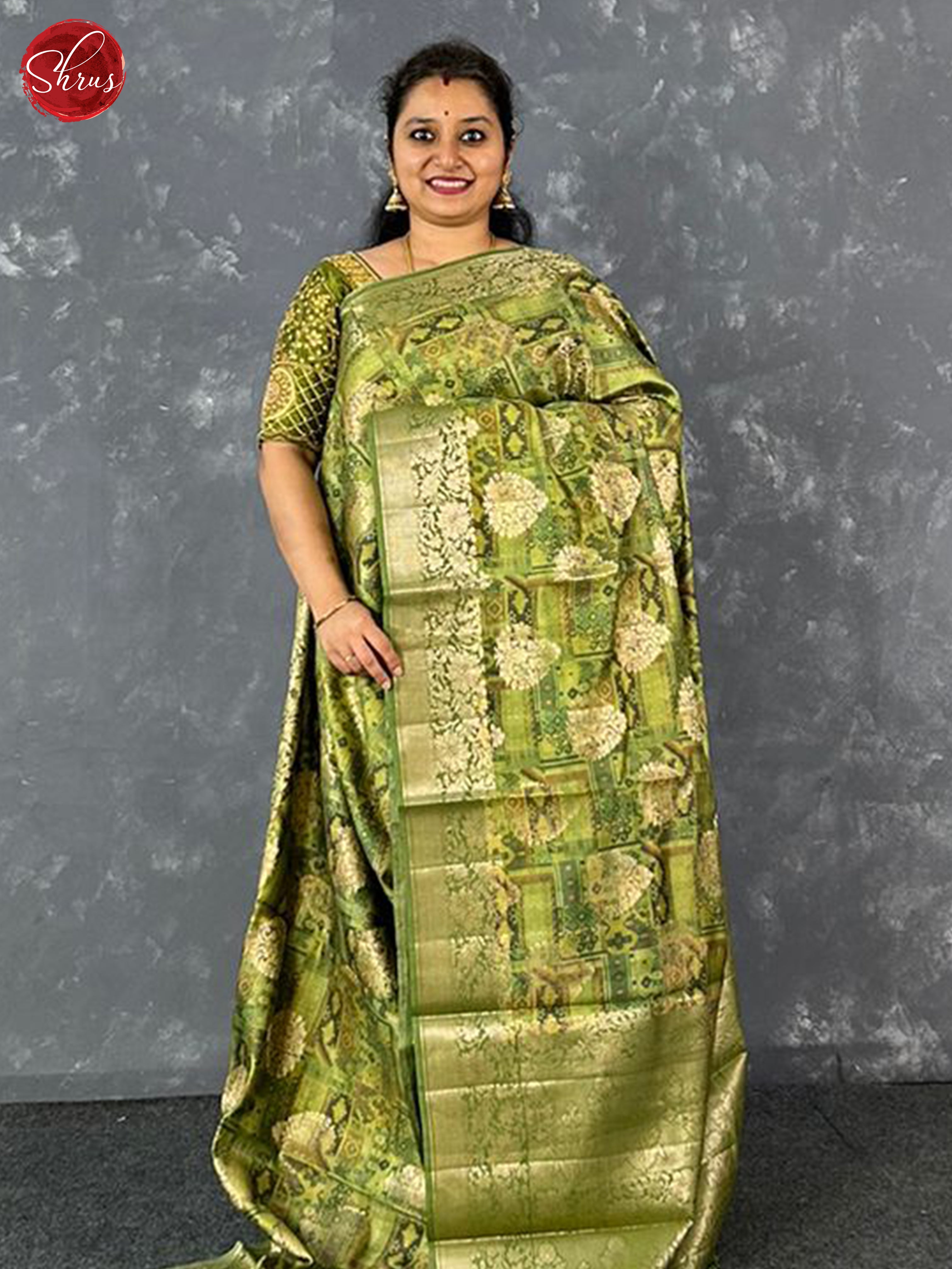 Green(Single Tone)- Tussar with floral print , zari motifs on the body& Zari Border