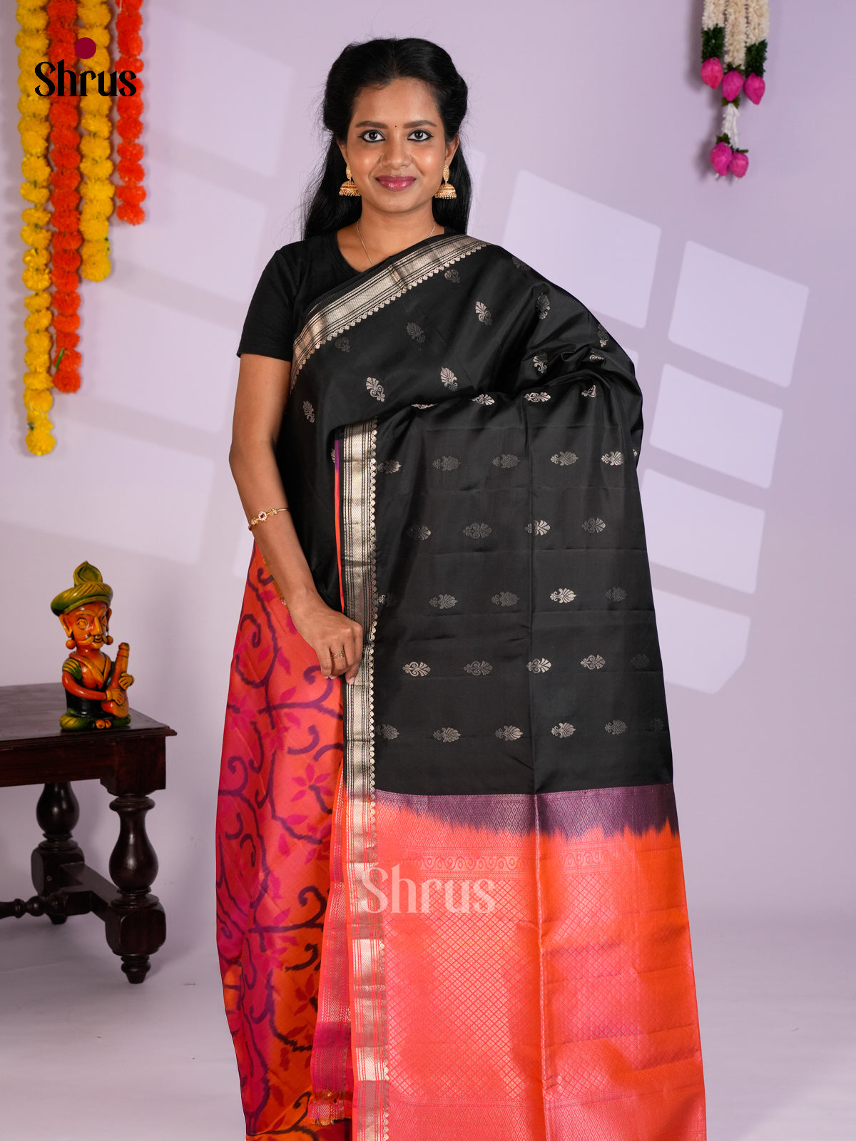 Buy Contemporary Black Half & Half Soft Silk Saree with Floral Buttas & Orange Ikkat Floral Nestling
