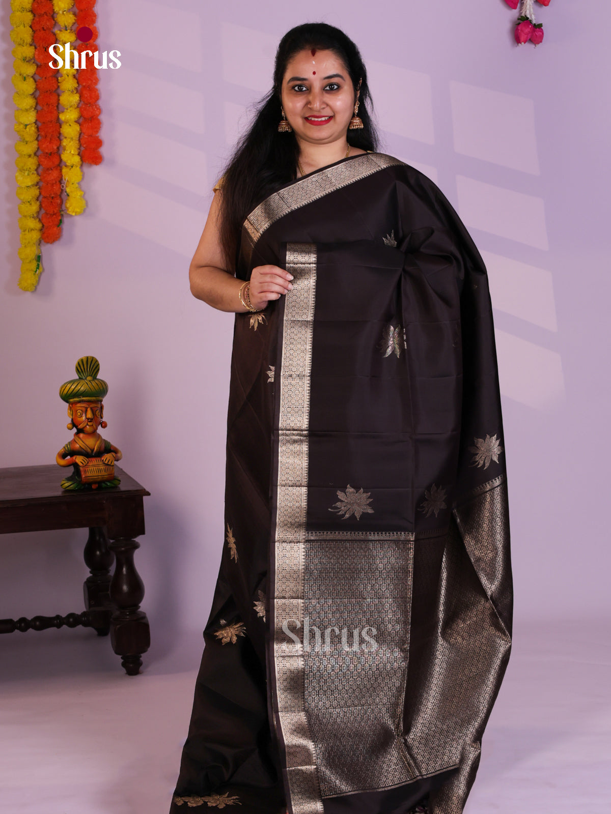 Buy Mystique Black Soft Silk Saree with Floral Buttas And Zari Woven Border & Pallu