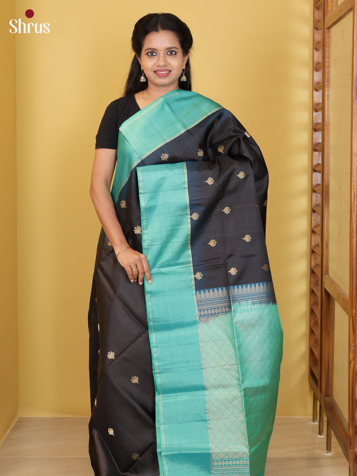Buy Luxurious Black Soft Silk Saree with Floral Buttas, Teal Border & Criss Cross Brocade Pallu
