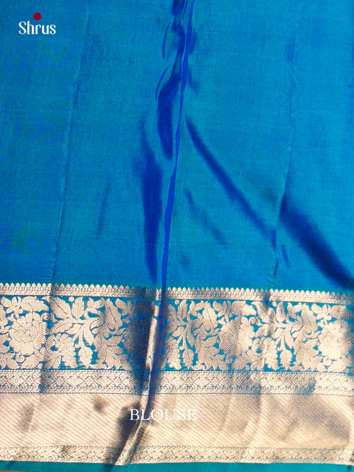 Buy Glimmering Blue Kanjivaram Saree with Zari Floral Nestling & Brocade Pallu