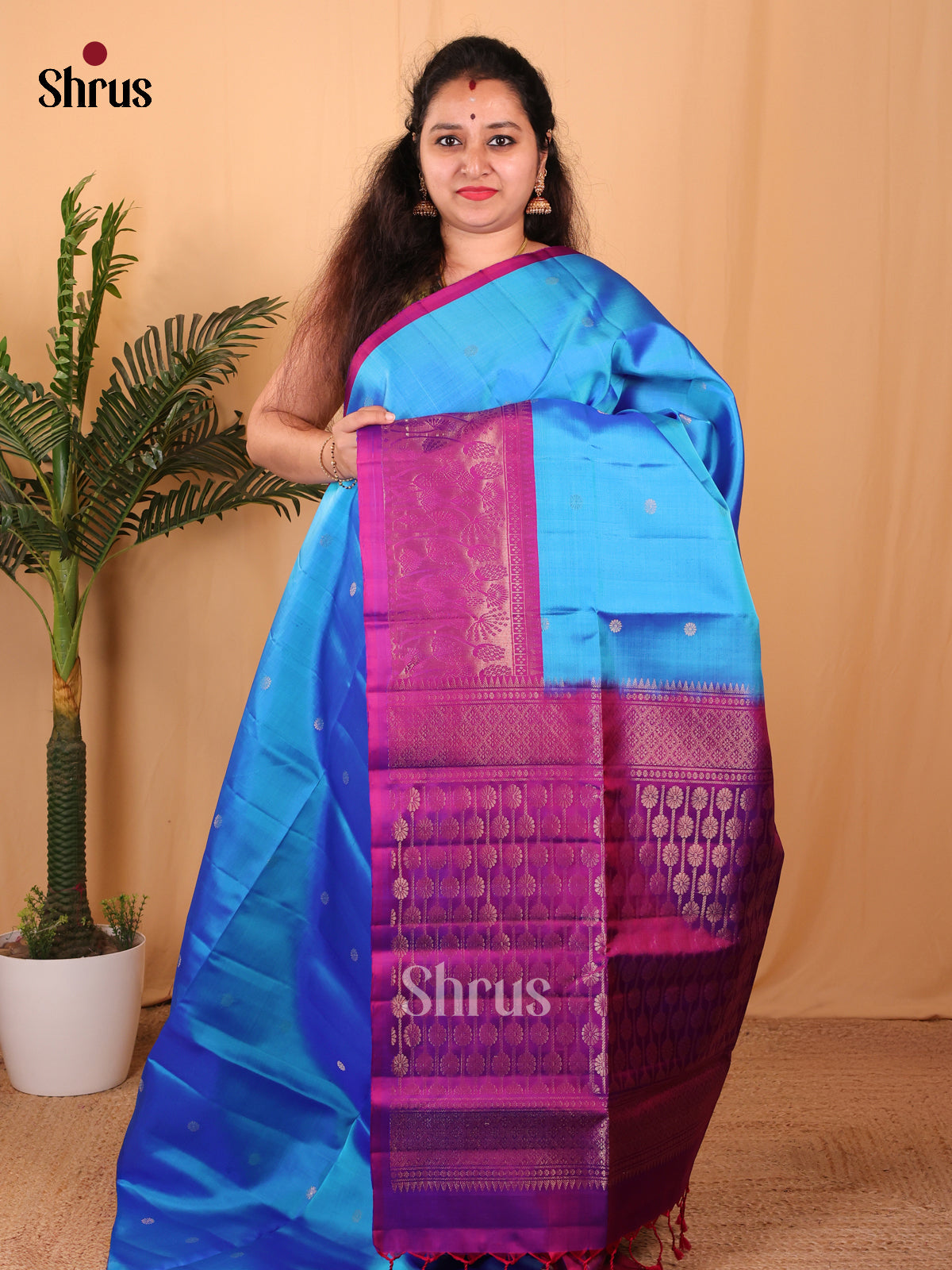Enchanting Blue Soft Silk Saree With Zari Buttas, Purple Border With Floral Motifs & Brocade Pallu