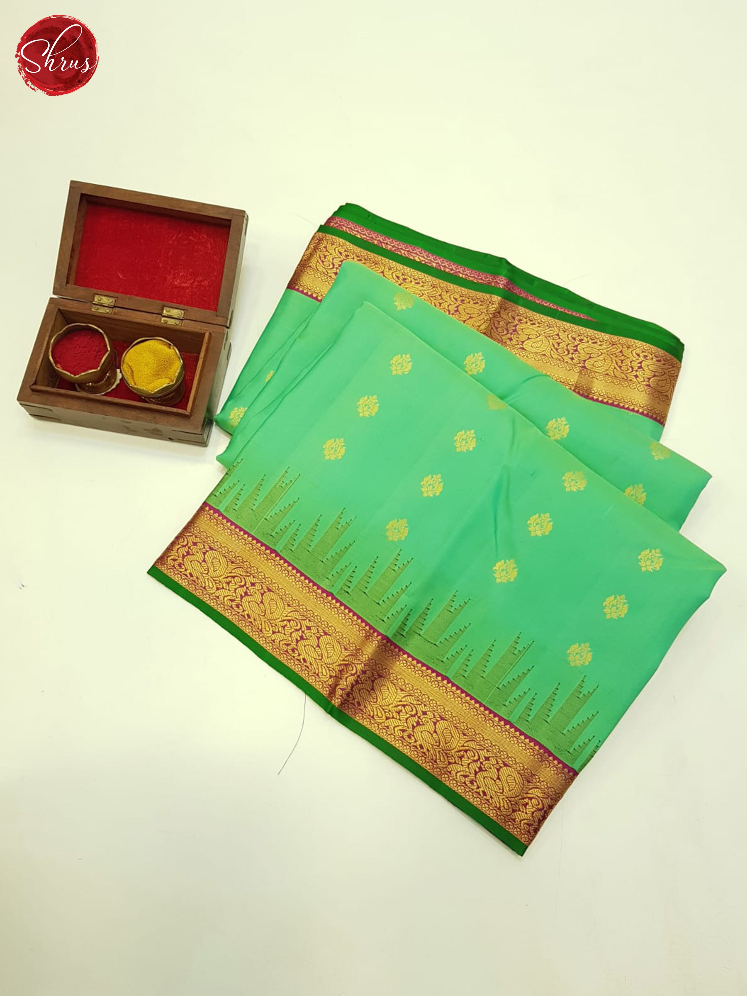 Bold Green And Maroon Kanchipuram Silk Saree With Zari Woven Floral Buttas-1