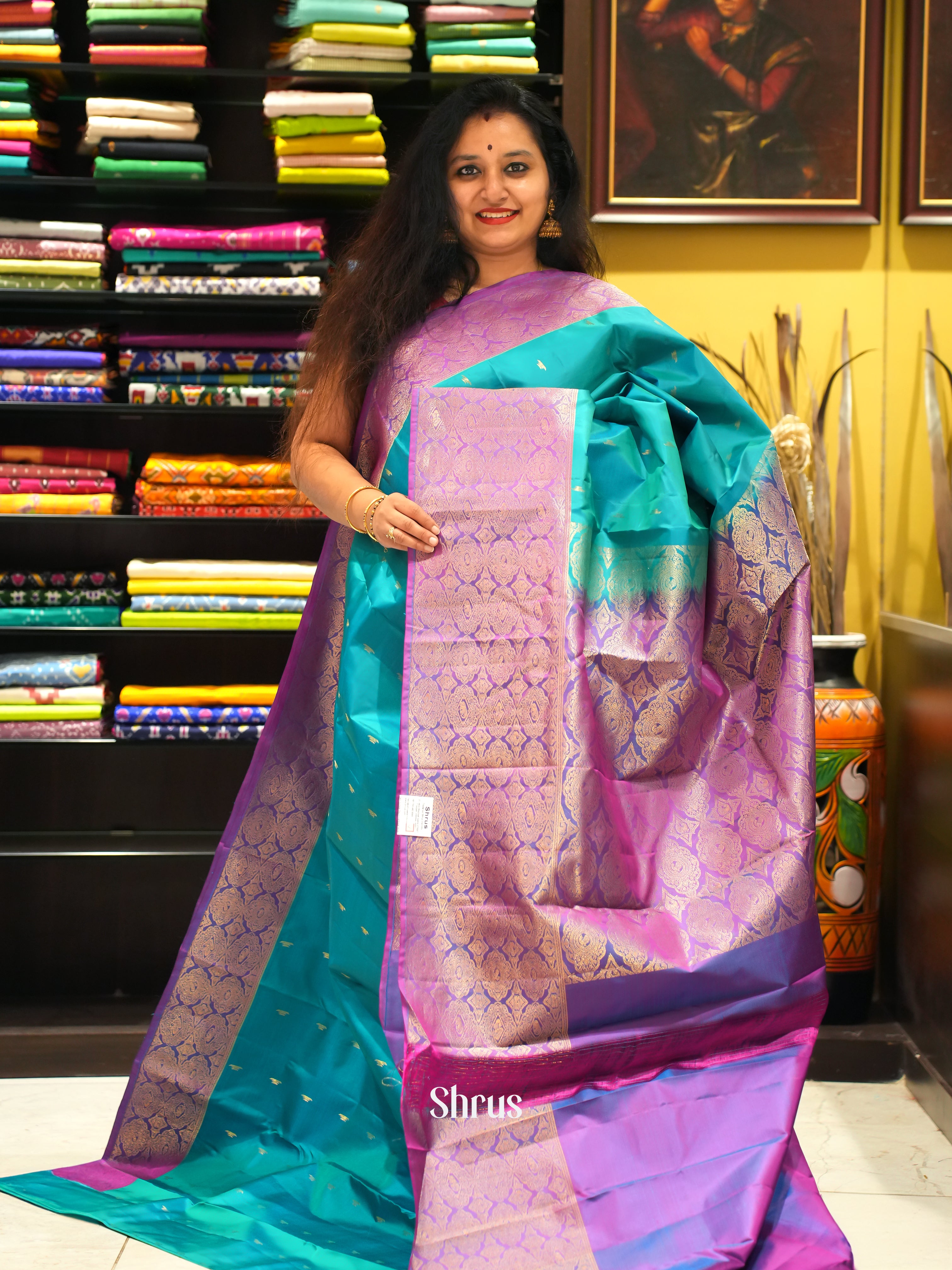 Pretty Teal and Purple Authentic Kanchipuram silk saree Featuring Zari Woven Golden Buttas-1