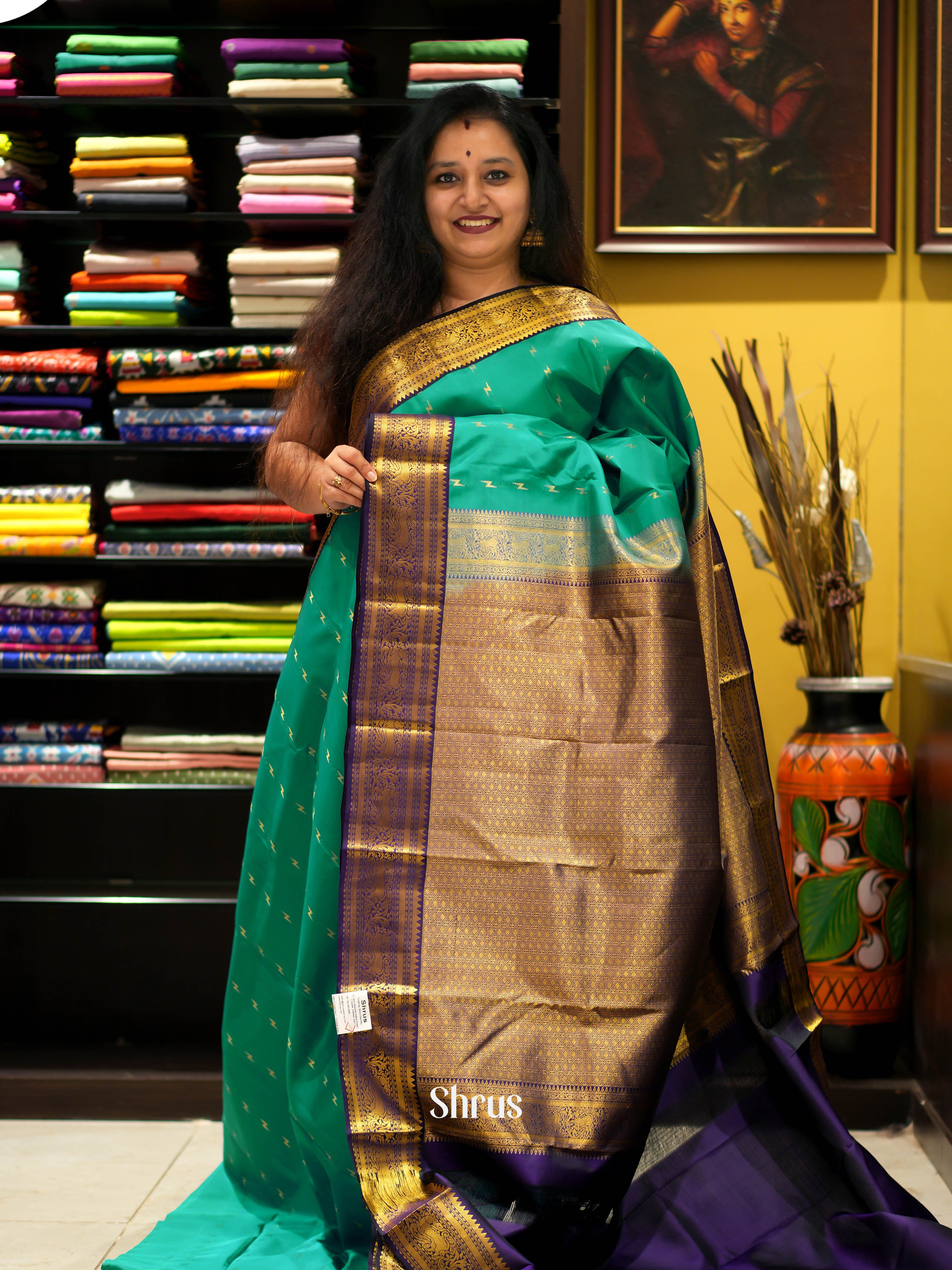 Graceful Teal Green and Violet Bridal Kanchipuram Silk Saree With Golden Zari Woven Small Buttas-1
