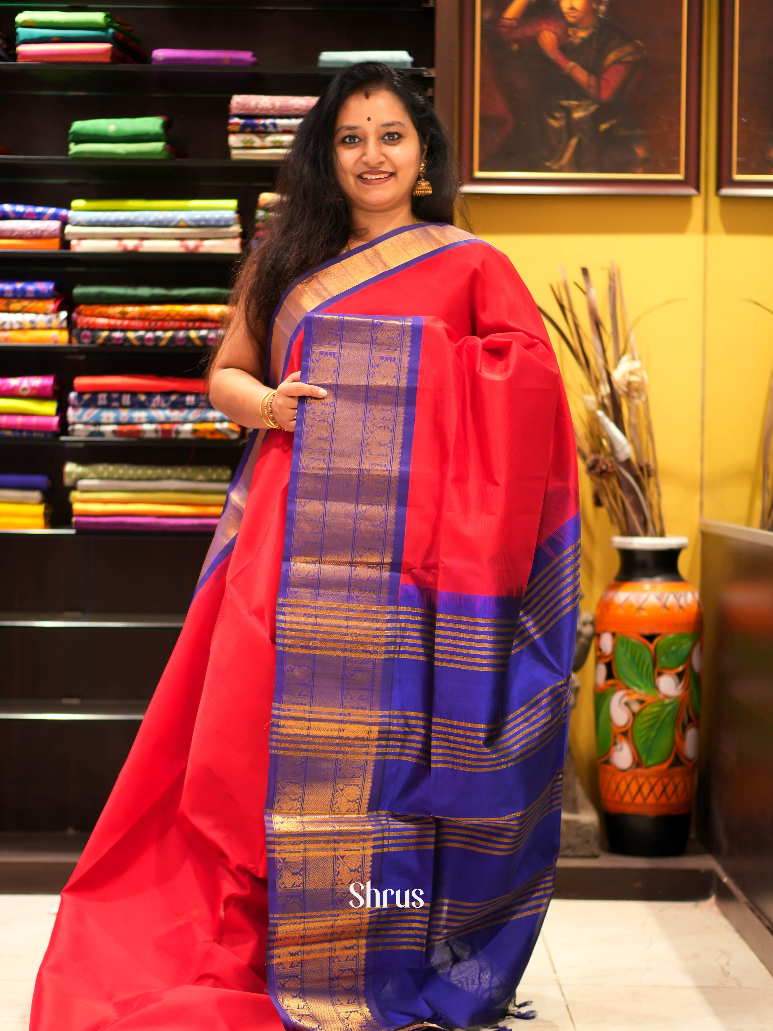 Beautiful Red Silk Cotton Saree With Plain Body And Contrast Blue Zari Woven Border With Small Peacock design - Shop on ShrusEternity.com