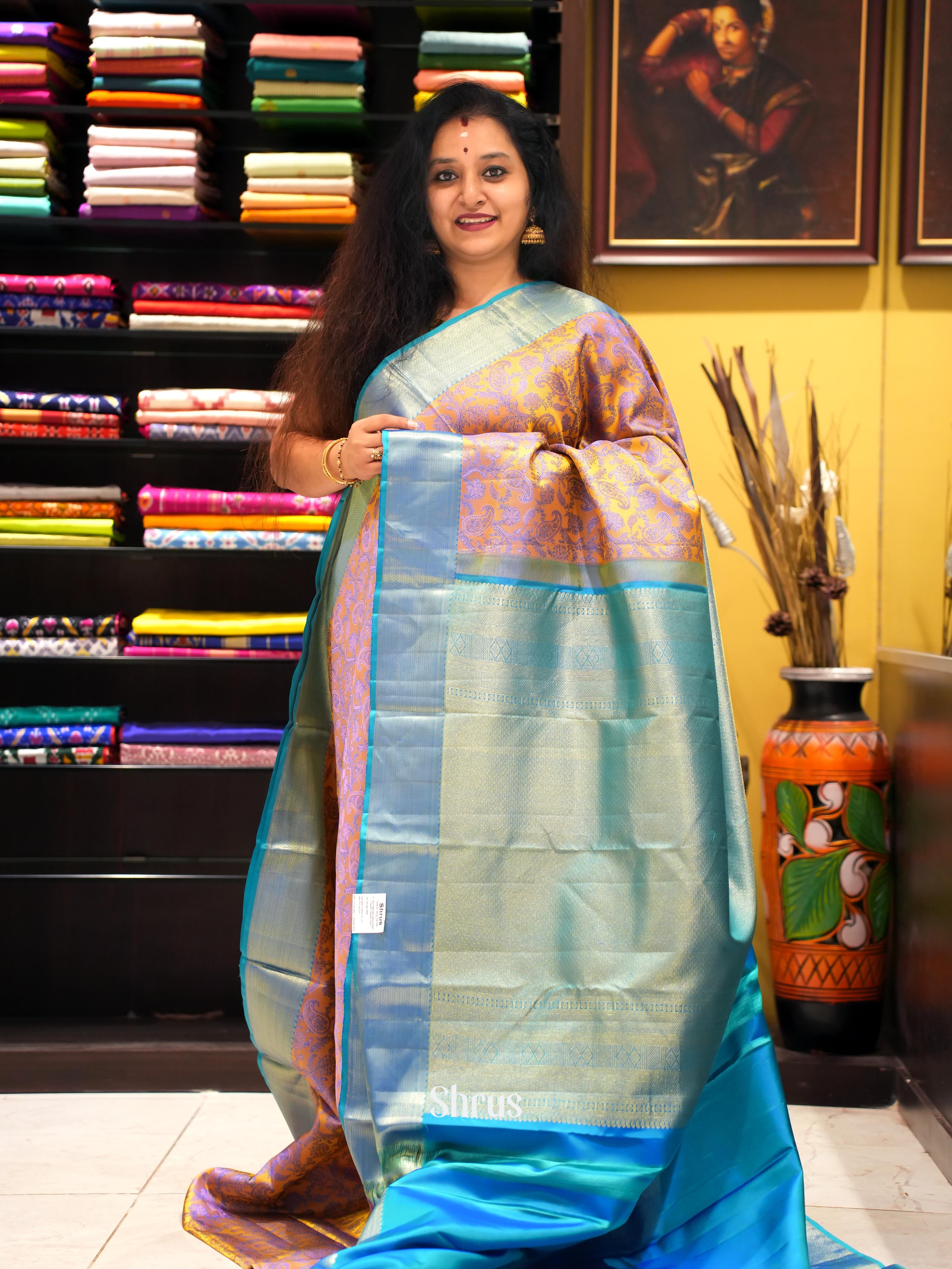 Glorious Golden Brown and Teal Kanchipuram silk Saree Adorned With Woven Paisleys-1