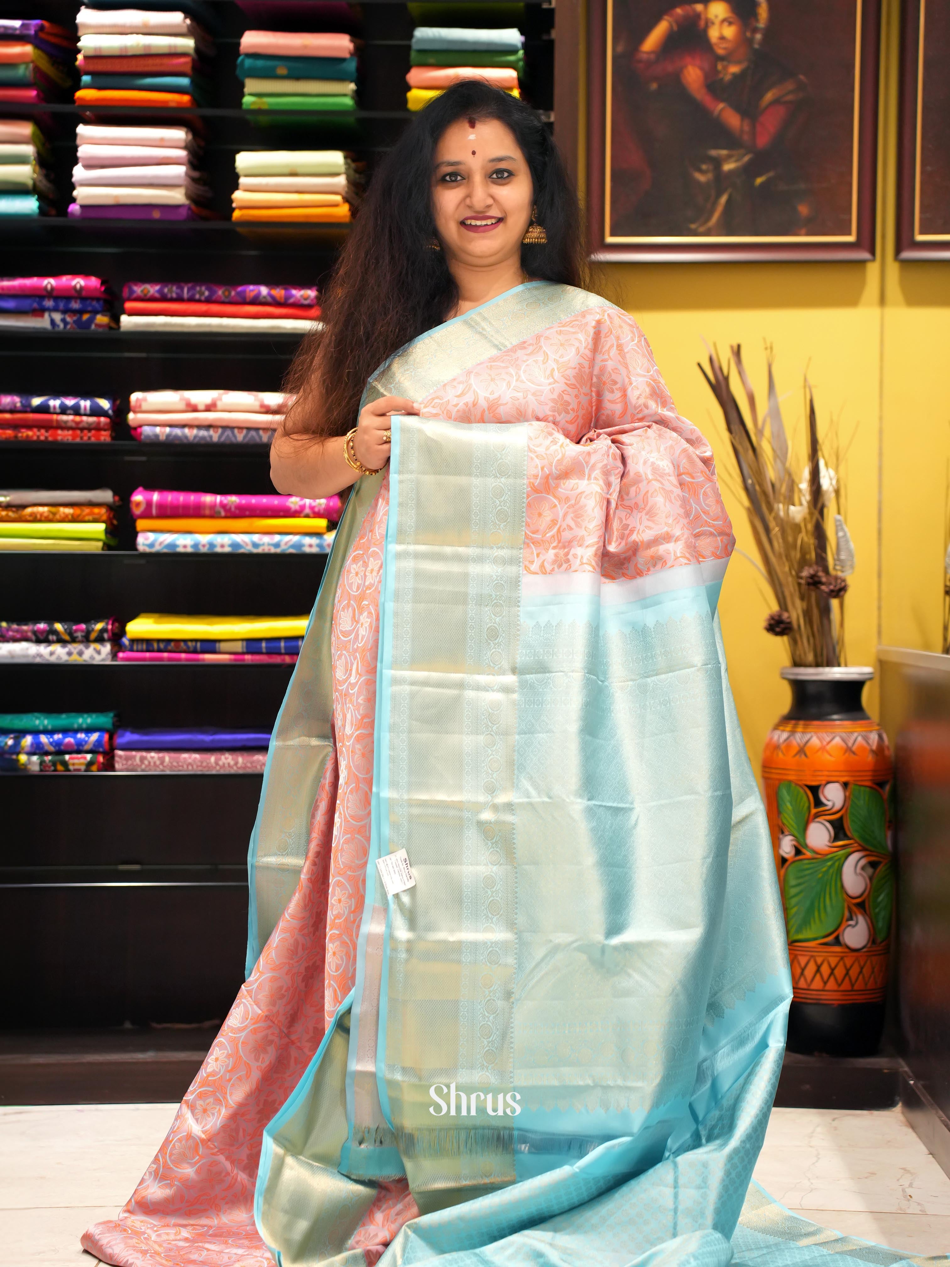 Pastel pink and Blue Kanchipuram silk Saree Adorned With Floral Nestling Pattern-1