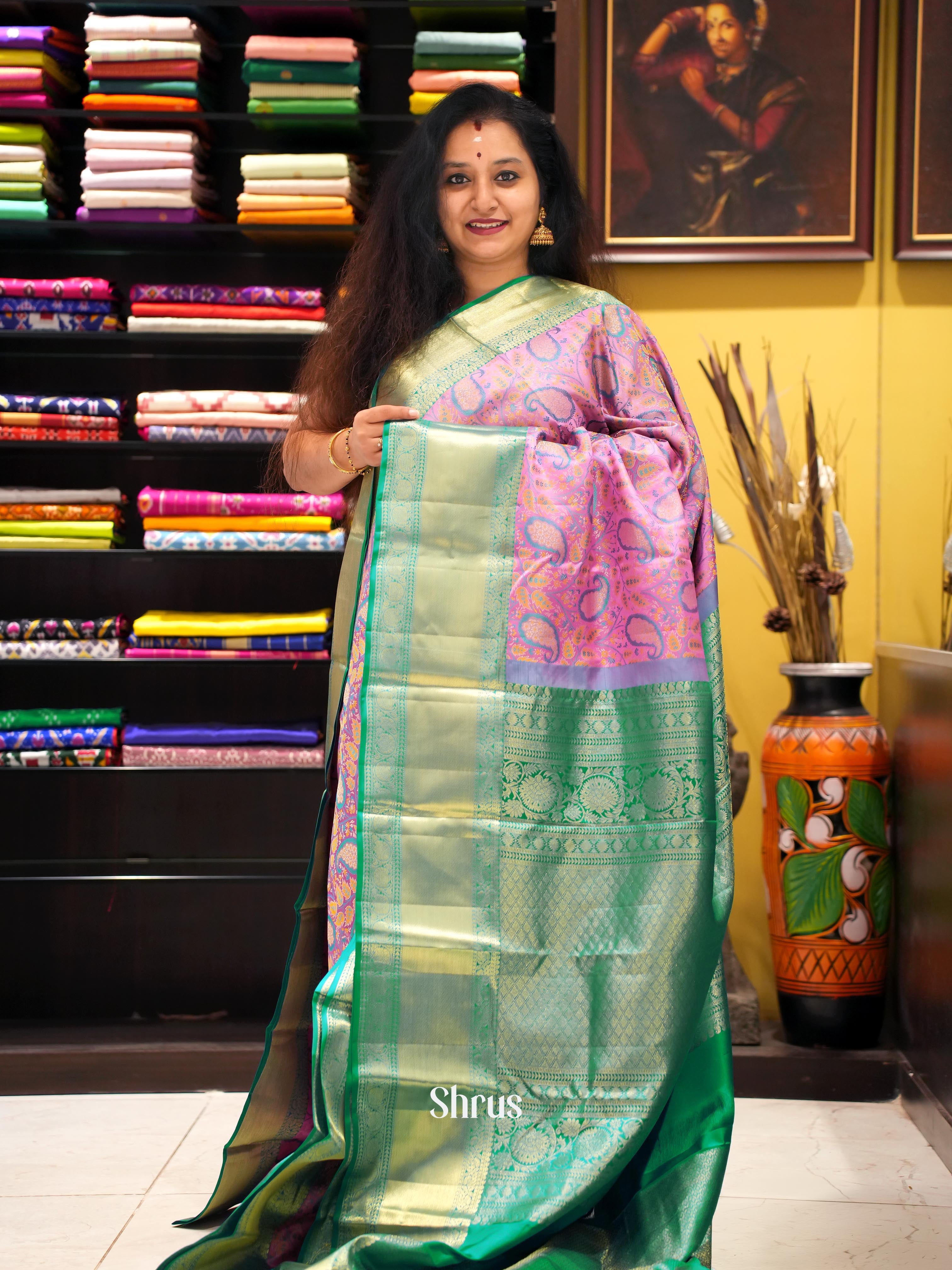 Pink and Teal Pure Kanchipuram silk Saree Adorned With woven Paisleys Nestled In Floral Patterns-1