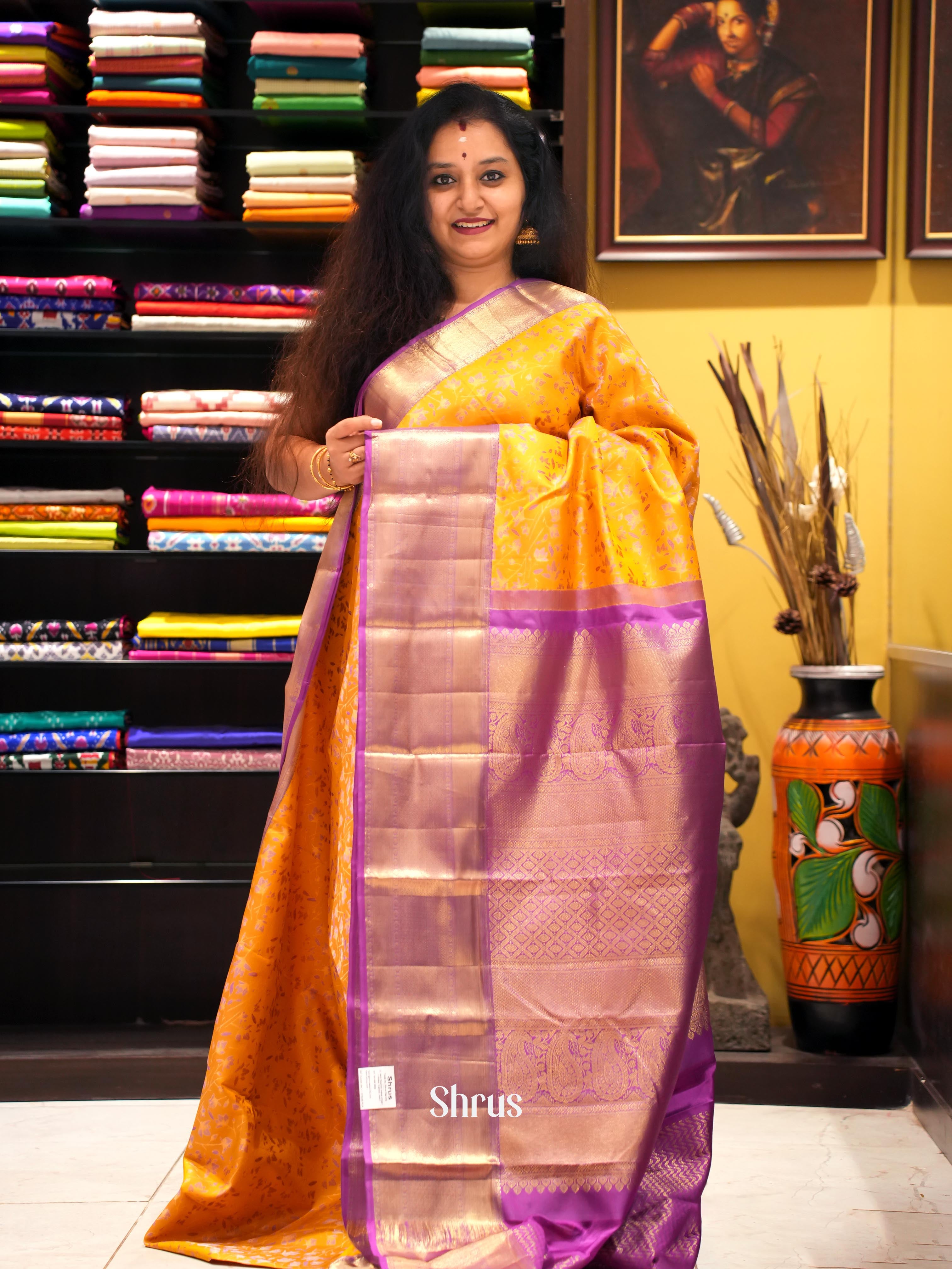 Yellow and Purple Bridal Kanchipuram silk Saree With Intricately Woven Floral Nestling Motifs-1