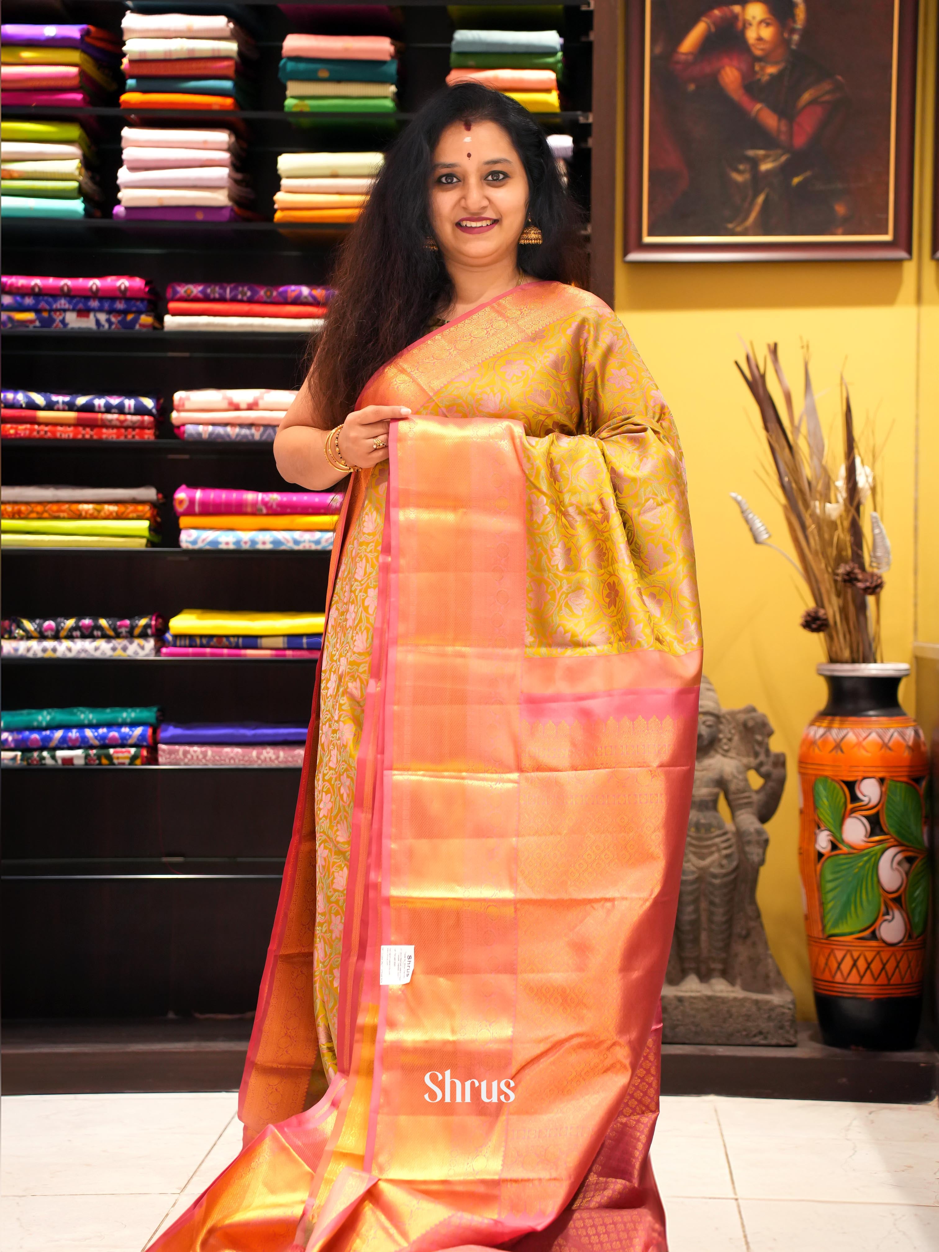 Exquisite Mustard and Pink Bridal Kanchipuram silk Saree With Floral Nestling Pattern-1
