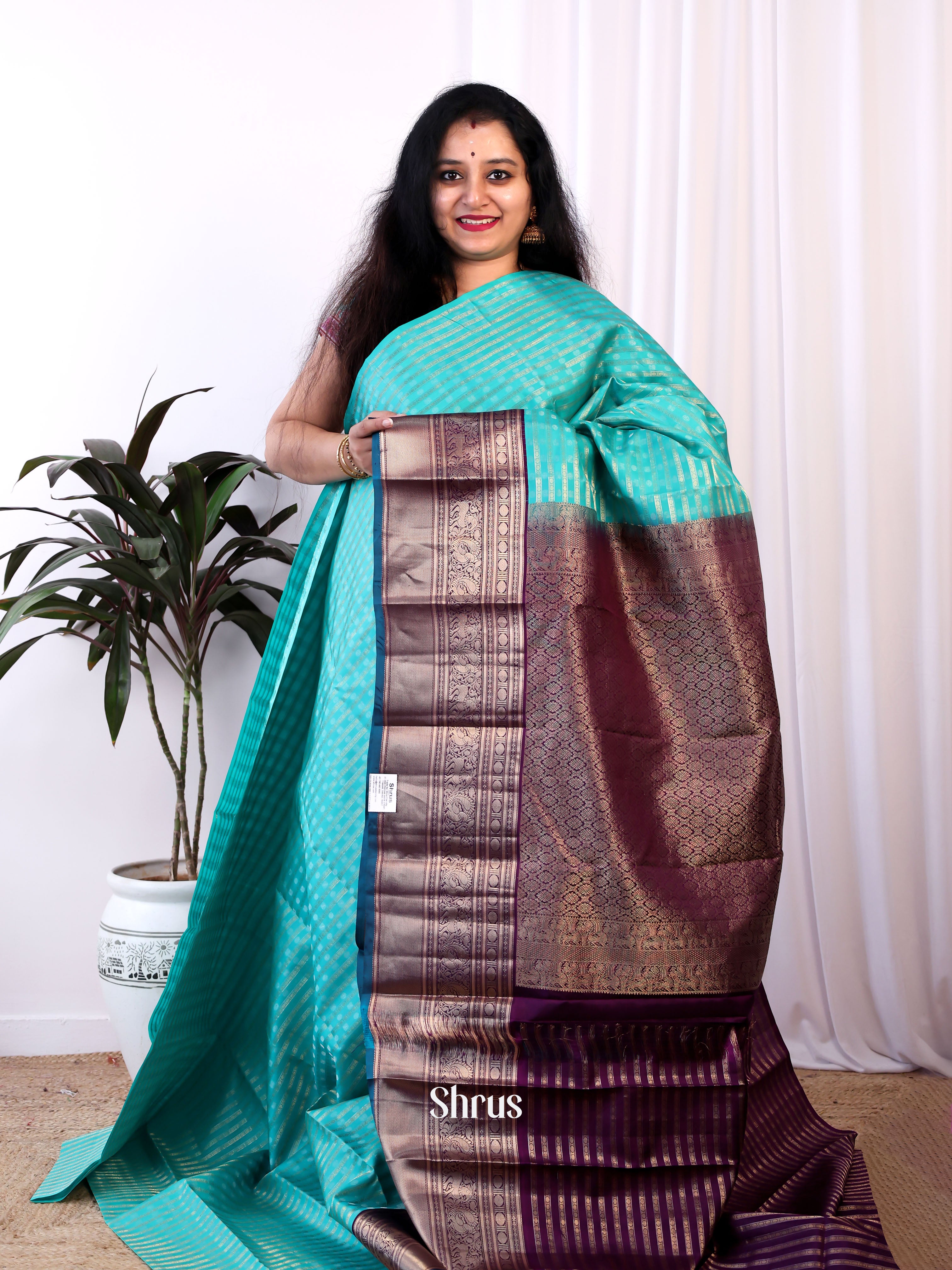 Teal and Purple Pure Kanchipuram silk Saree Adorned With Beautiful Zari Woven Stripes-1