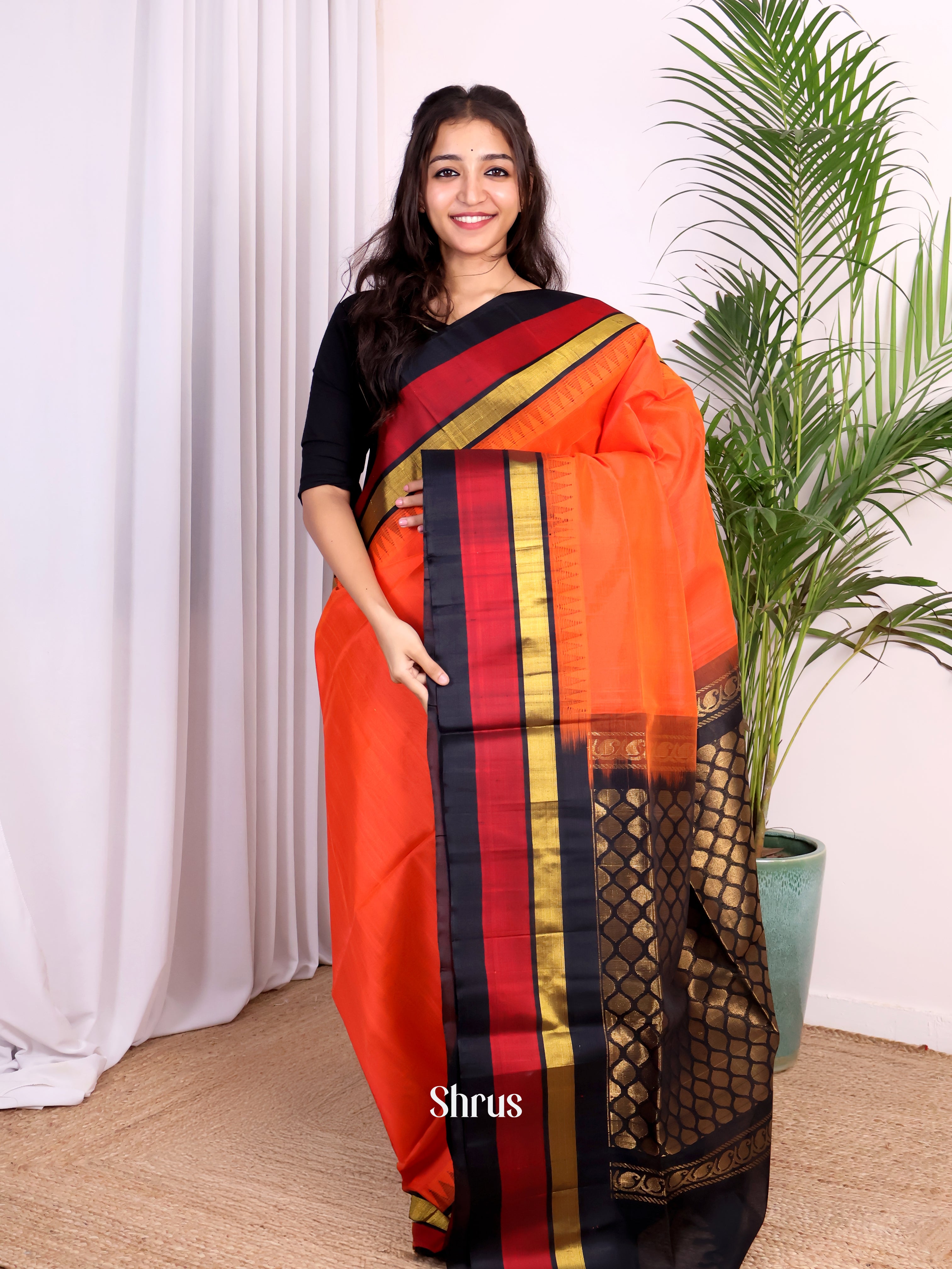Orange Silk Cotton Saree With Contrast Black And Maroon Zari Woven Temple Border - Shop on Shrus.com