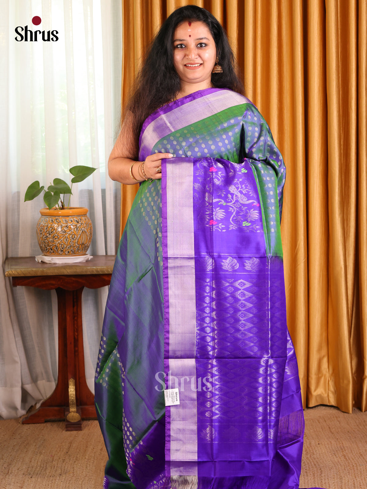 Majestic Green Uppada Silk Saree with Purple Zari Pallu