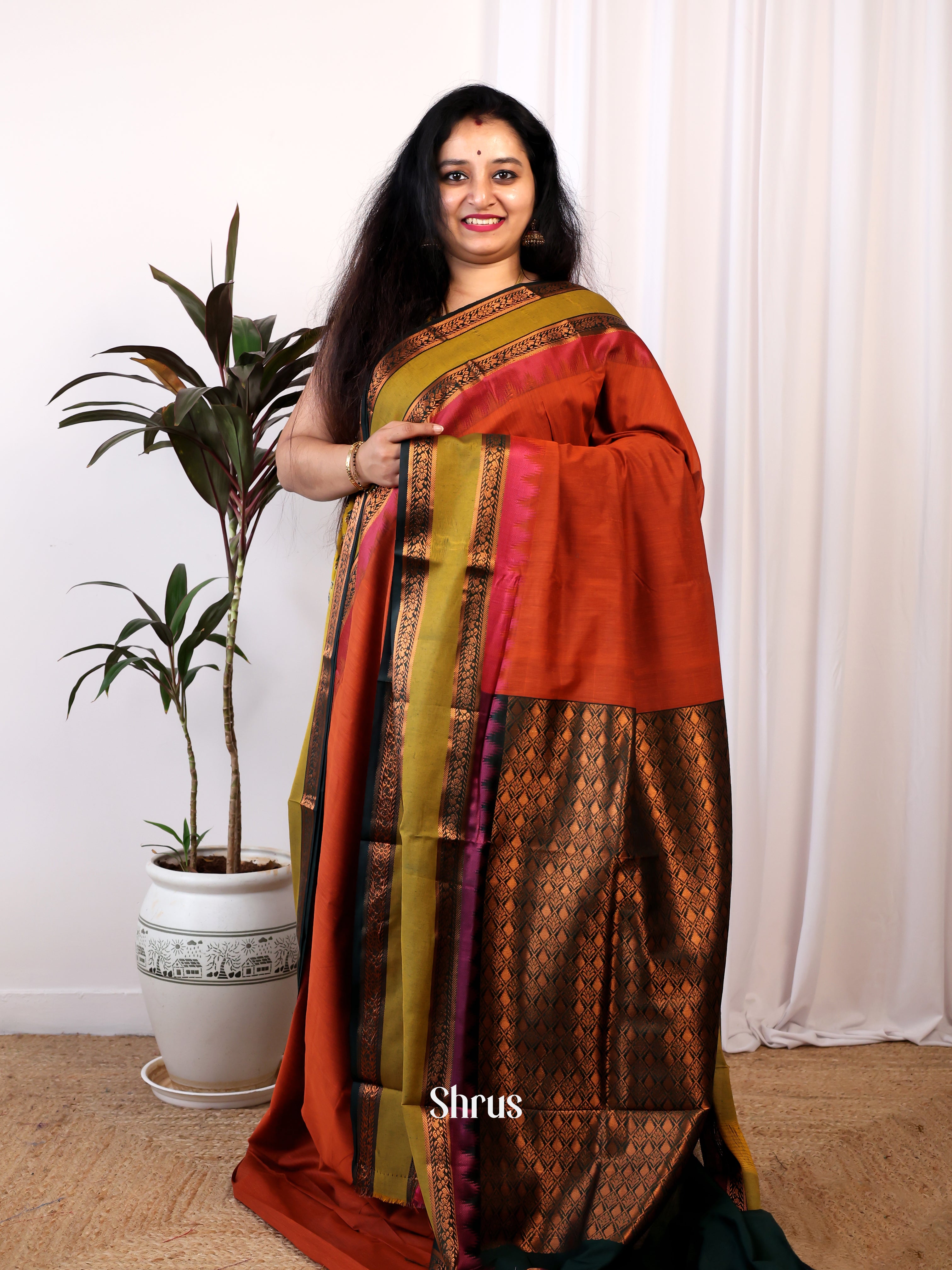 Exquisite Brick Kalyani Cotton Saree With Green Rettapet Border With Copper Zari - Shop on Shrus.com