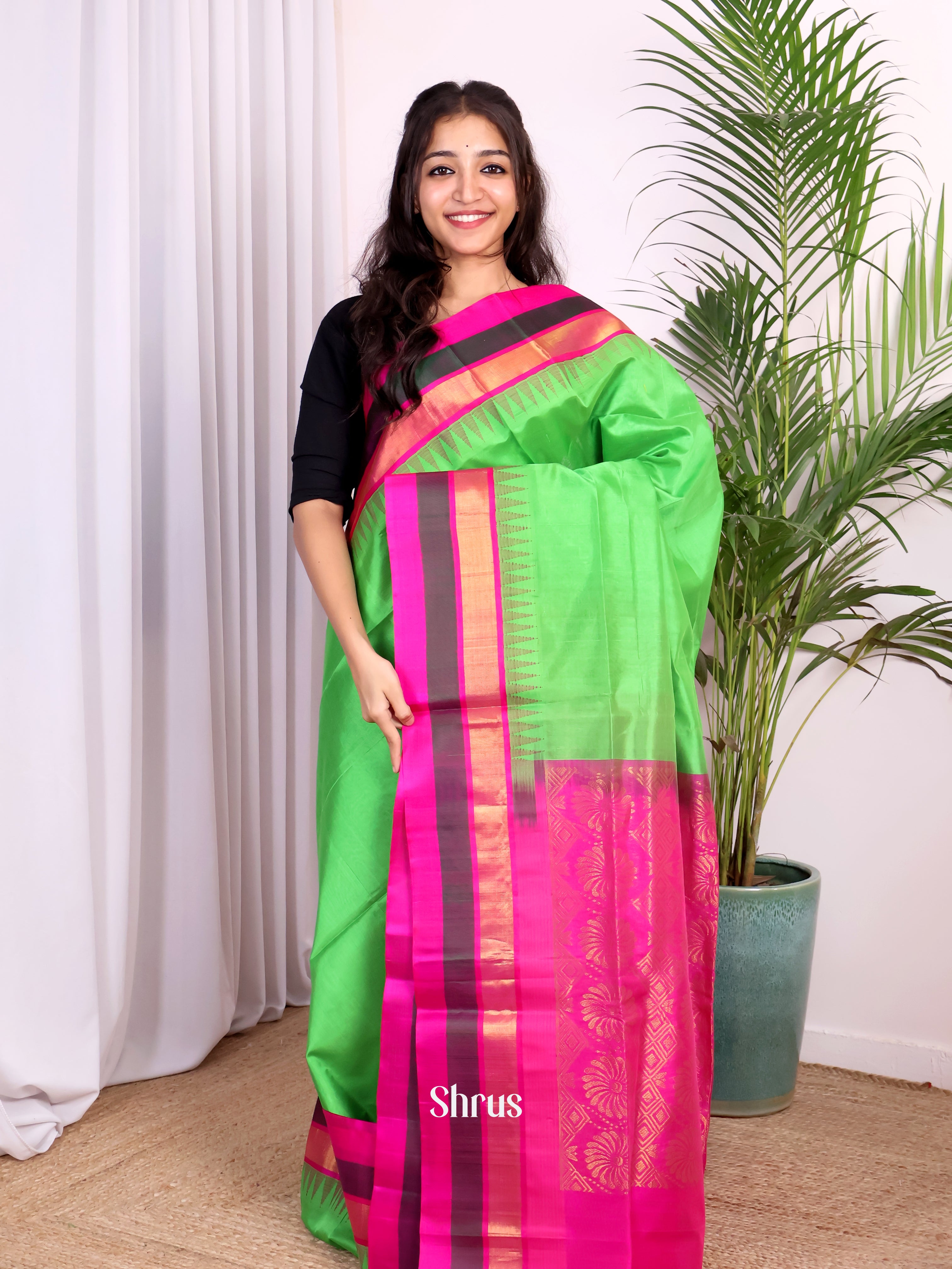 Vibrant Green Silk Cotton Saree With Contrast Pink And Brown Zari Woven Temple Border