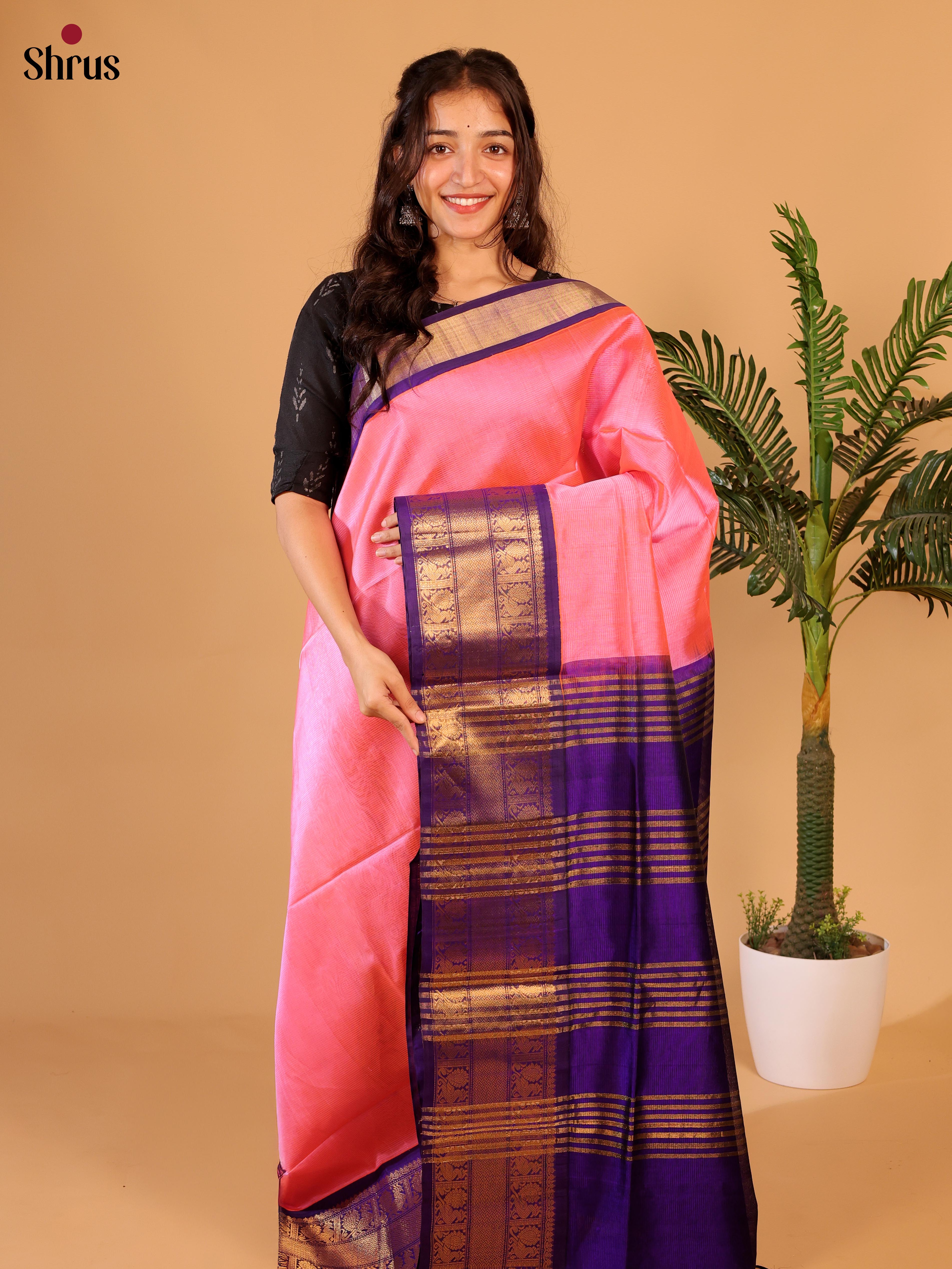 Enchanting Pink Silk Cotton Saree With Plain Body And Contrast Violet Zari Woven Border With Small Peacock design - Shop on Shrus.com