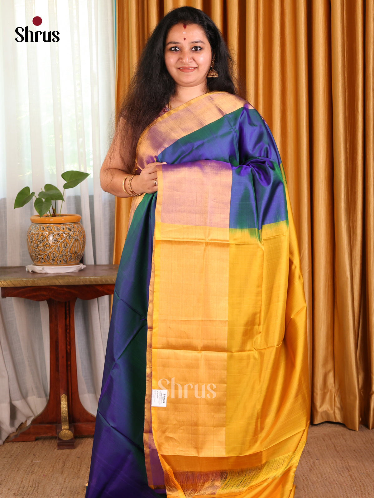 Exquiiste Peacock Blue Uppada silk Saree with plain body & contrast Border - Shop on Shrus.com