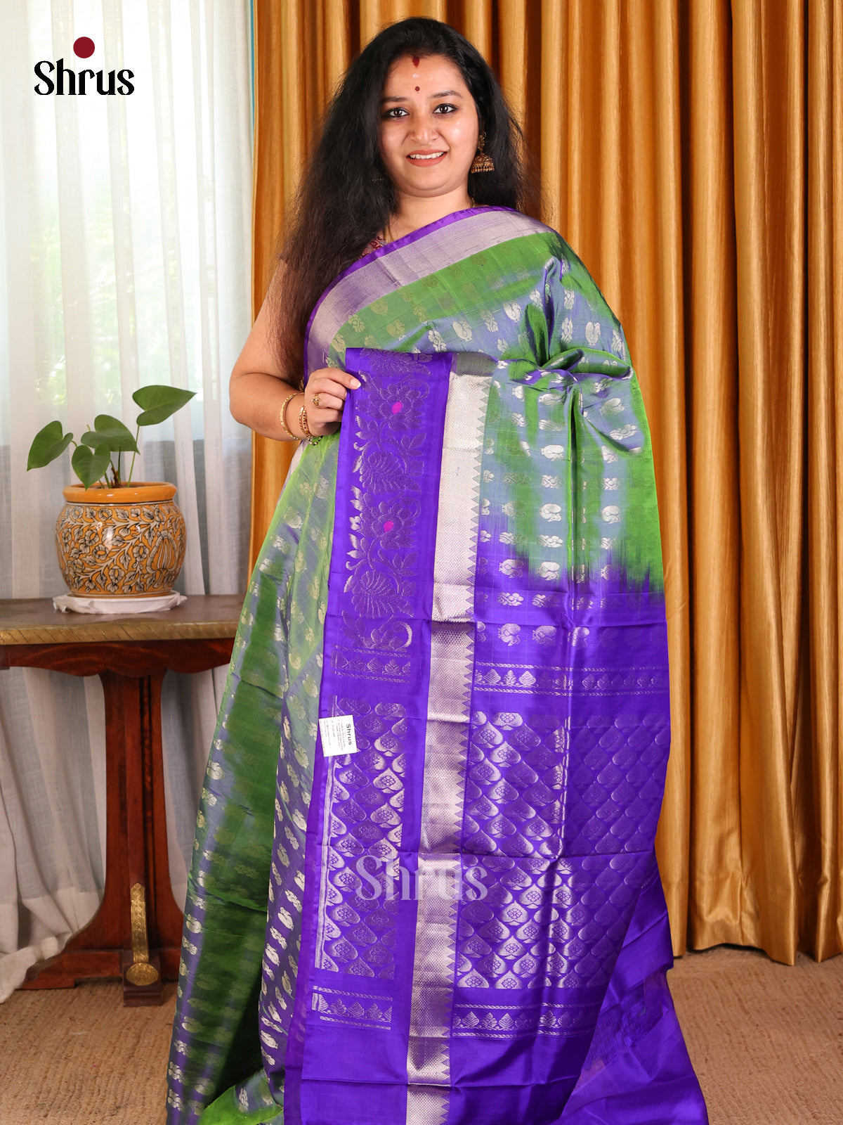 Double Shaded Green Uppada silk Saree with thousand zari buttas & contrast floral border
