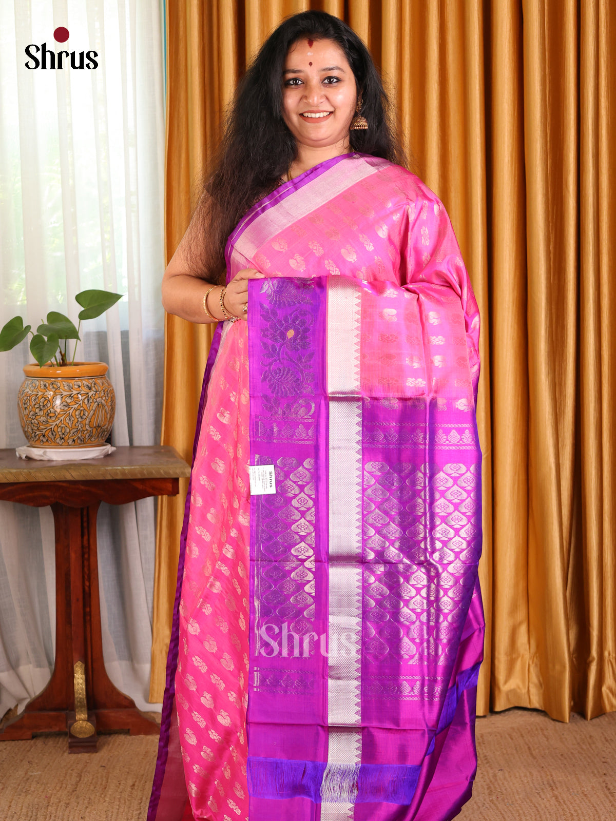 Charming Pink Uppada silk Saree with thousand zari peacock buttas & floral brocade pallu