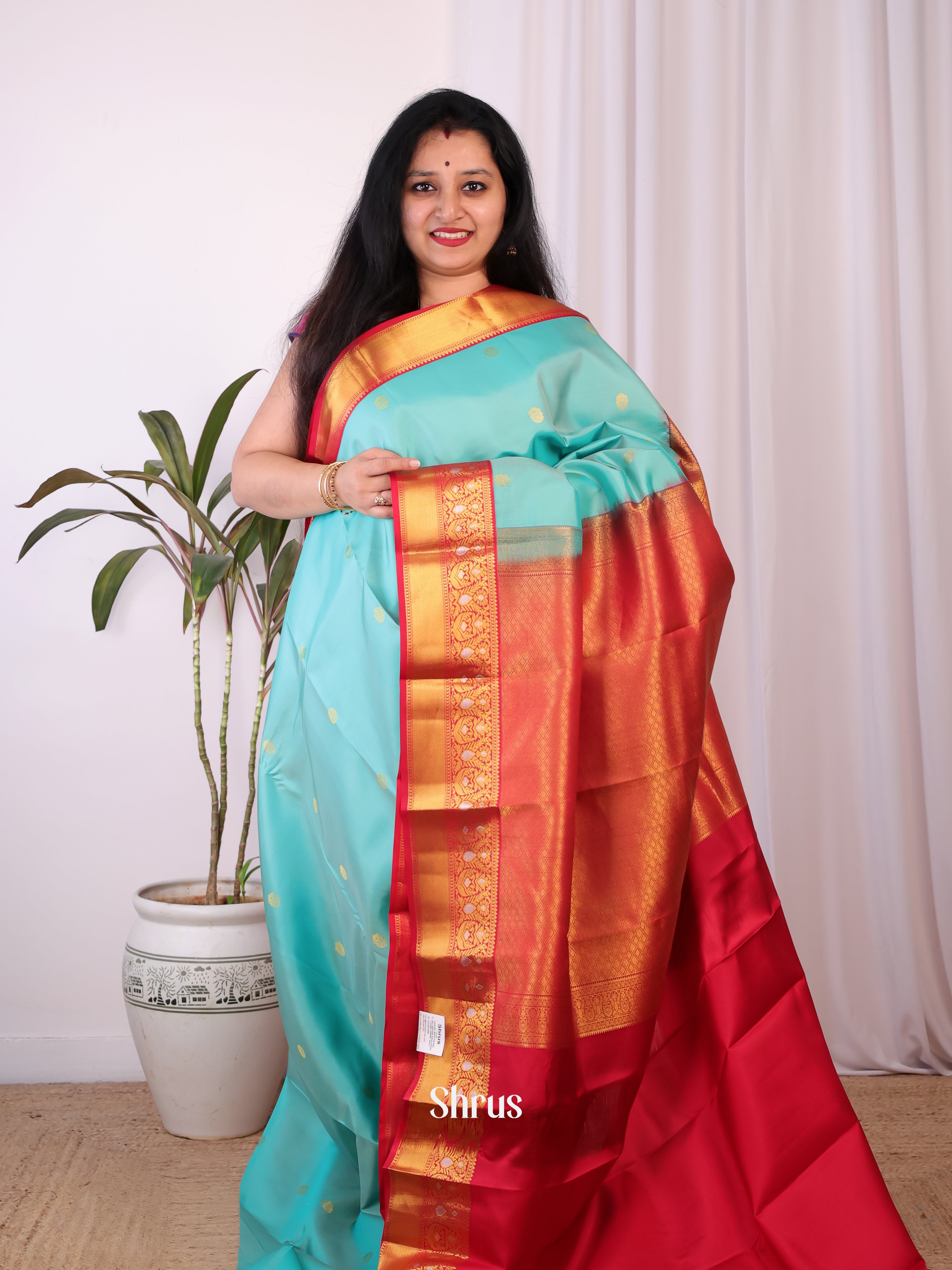 Teal and Red Pure Kanchipuram silk Saree Featuring Intricate Zari Woven Floral Buttas-1