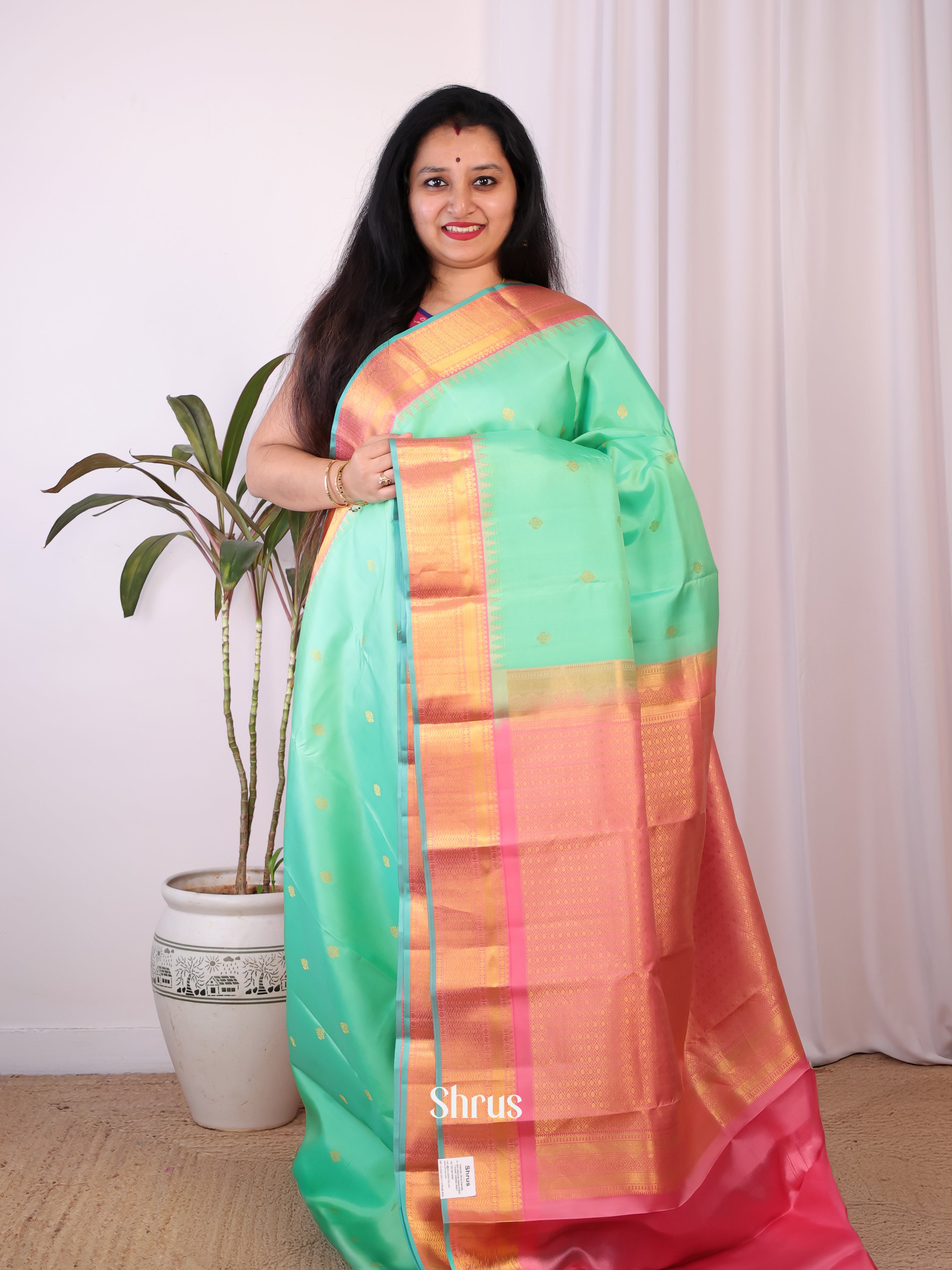 Stunning Teal Green and Pink Pure Kanchipuram silk Saree With Golden Zari Woven Buttas-1