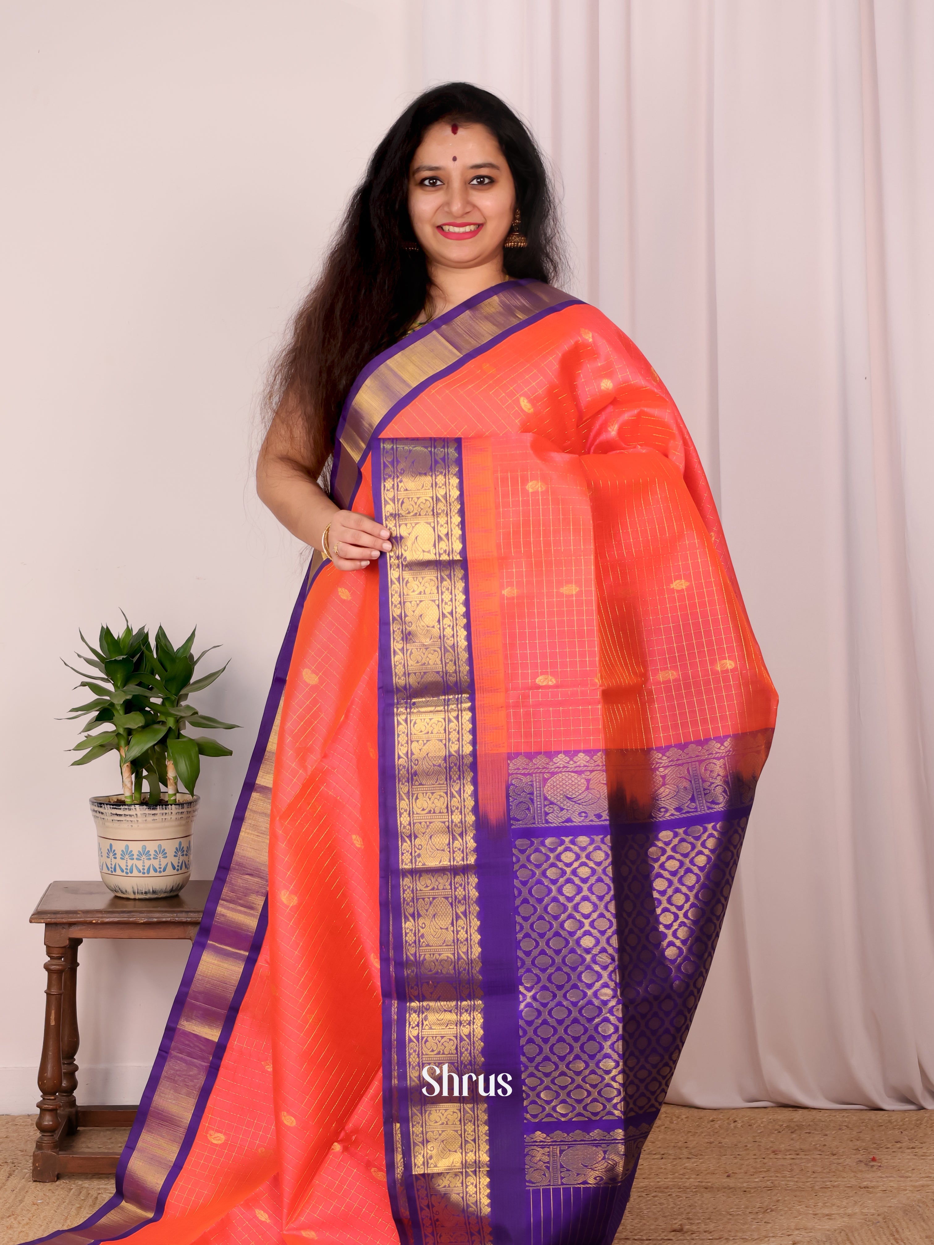 Exquisite Orangish Pink Silk Cotton Saree With Zari Kattams(Checks) and Buttas Across The Body and Contrast Violet Colour Zari Border - Shop on Shrus.com