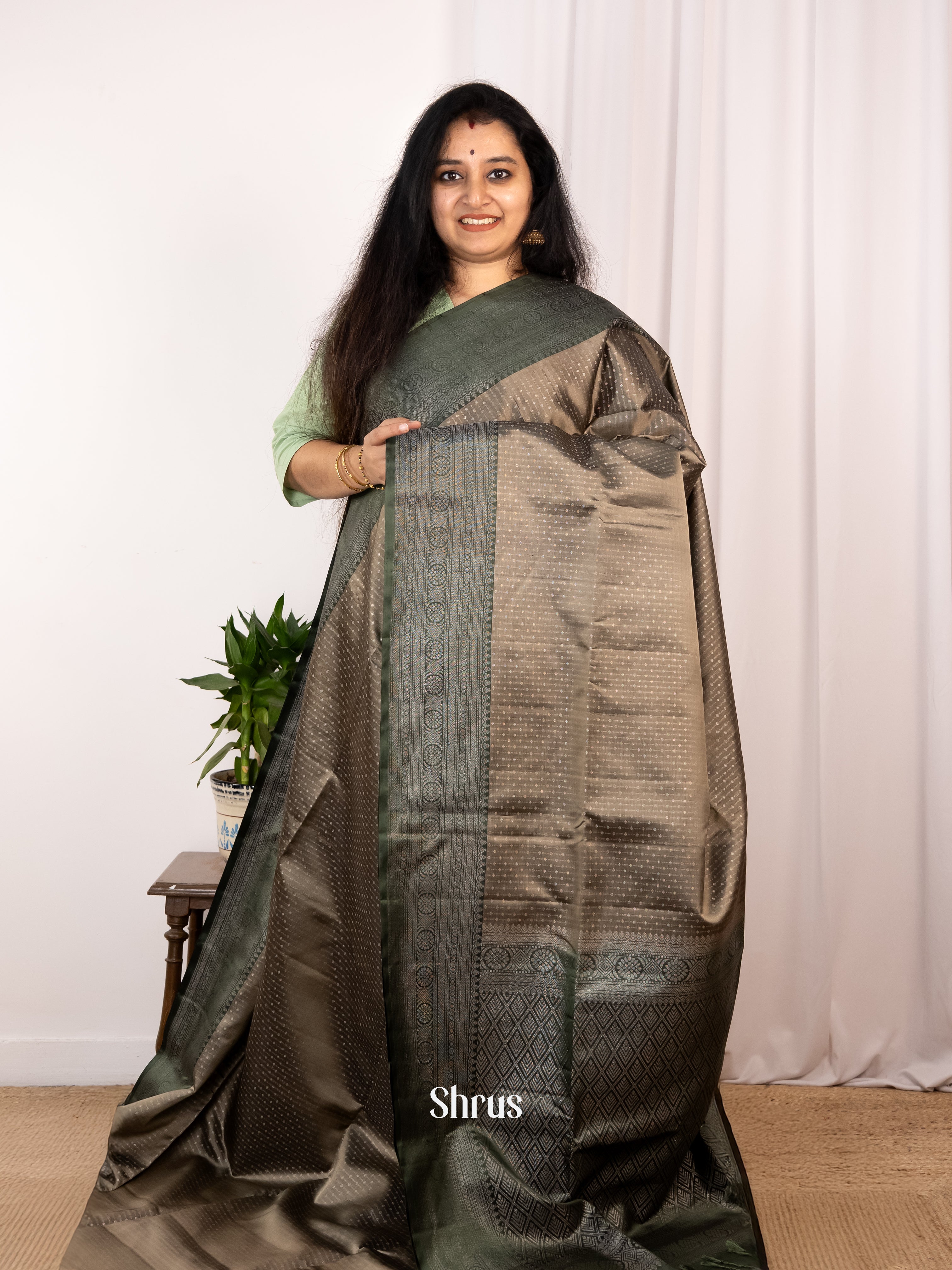 Chic Grey Soft Silk Saree With Intricately Woven Zari Buttas, Green Brocade Border & Pallu - Shop on Shrus.com