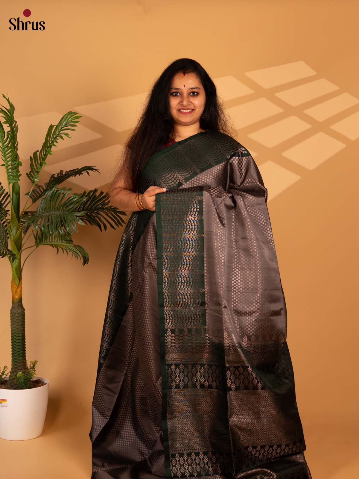 Elegant Grey Soft Silk Saree with Intricately Woven Zari Buttas, Green Brocade Border-1