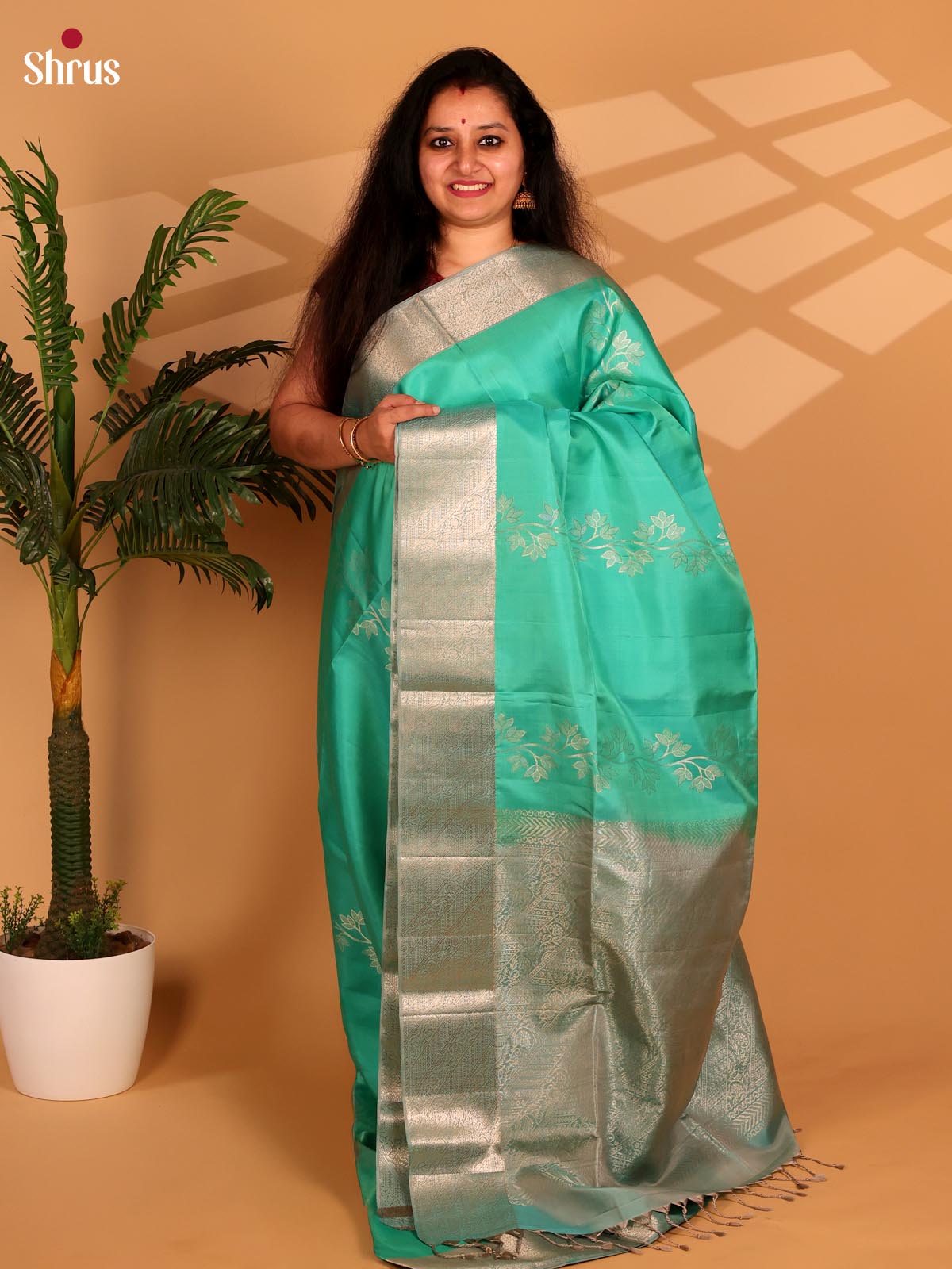 Elegant Teal Green Soft Silk Saree with Floral Zari Vines, Grey Border & Brocade Pallu - Shop on Shrus.com