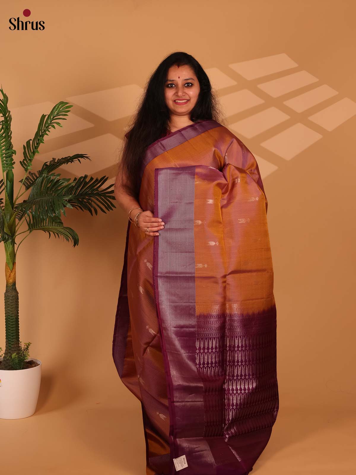 Stylish Rust Soft Silk Saree with Zari Buttas, Contrast Purple Border & Brocade Pallu-1