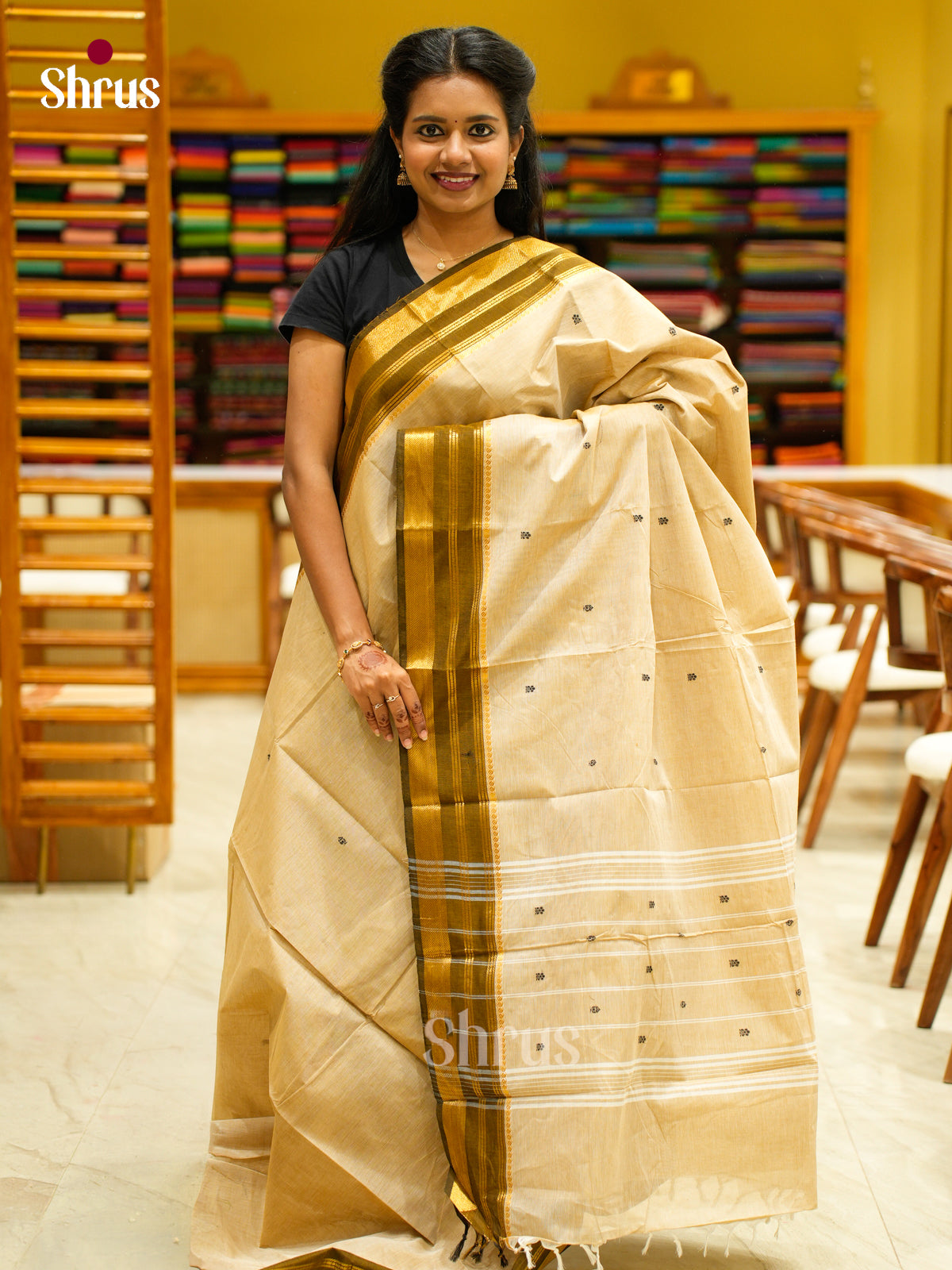 Charming Cream Chettinad Cotton Saree With Thread Buttas & Olive Green Zari Border