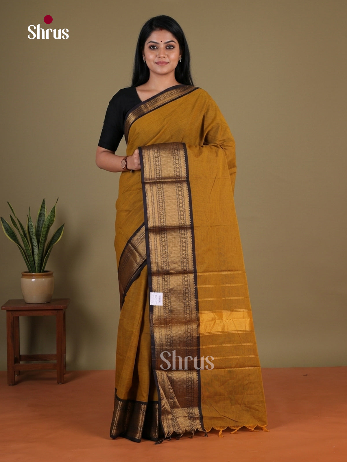 Charming Mustard Brown Chettinad Cotton Saree With plain Body & Black Broad Zari Border