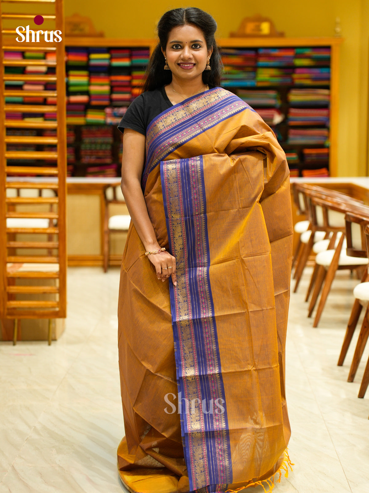 Chic Dark Mustard Chettinad Cotton Saree With Plain Body & Blue Rettapet Zari Border