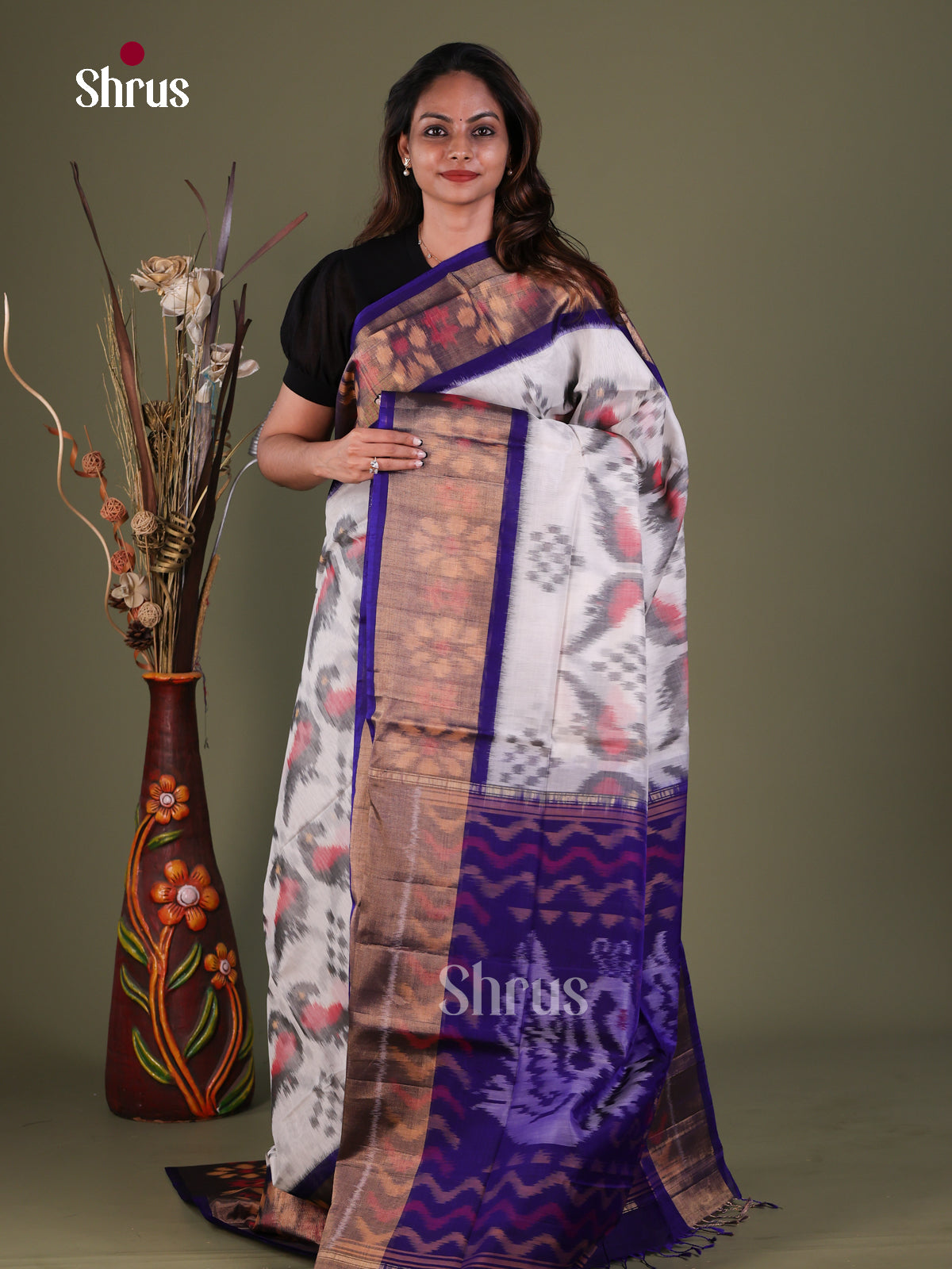 Chic Off White Pochampally Silk Cotton Saree With Parrot Ikat Prints & Violet Floral Border