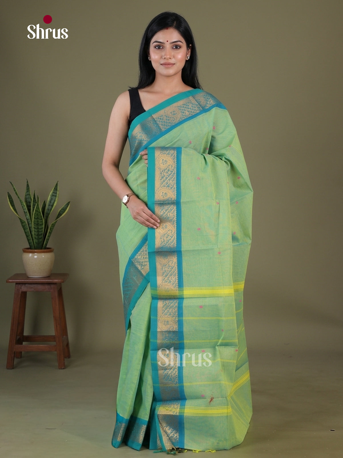 Chic Pista Green Chettinad Cotton Saree With Small Buttas & Turquoise Zari Border With Paisley Motifs