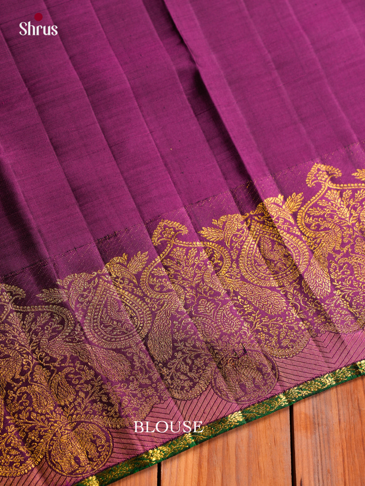 Chic Sea Green Kanchipuram Silk Saree With Intricate Checks Patterns & Purple Border With Paisley Motifs