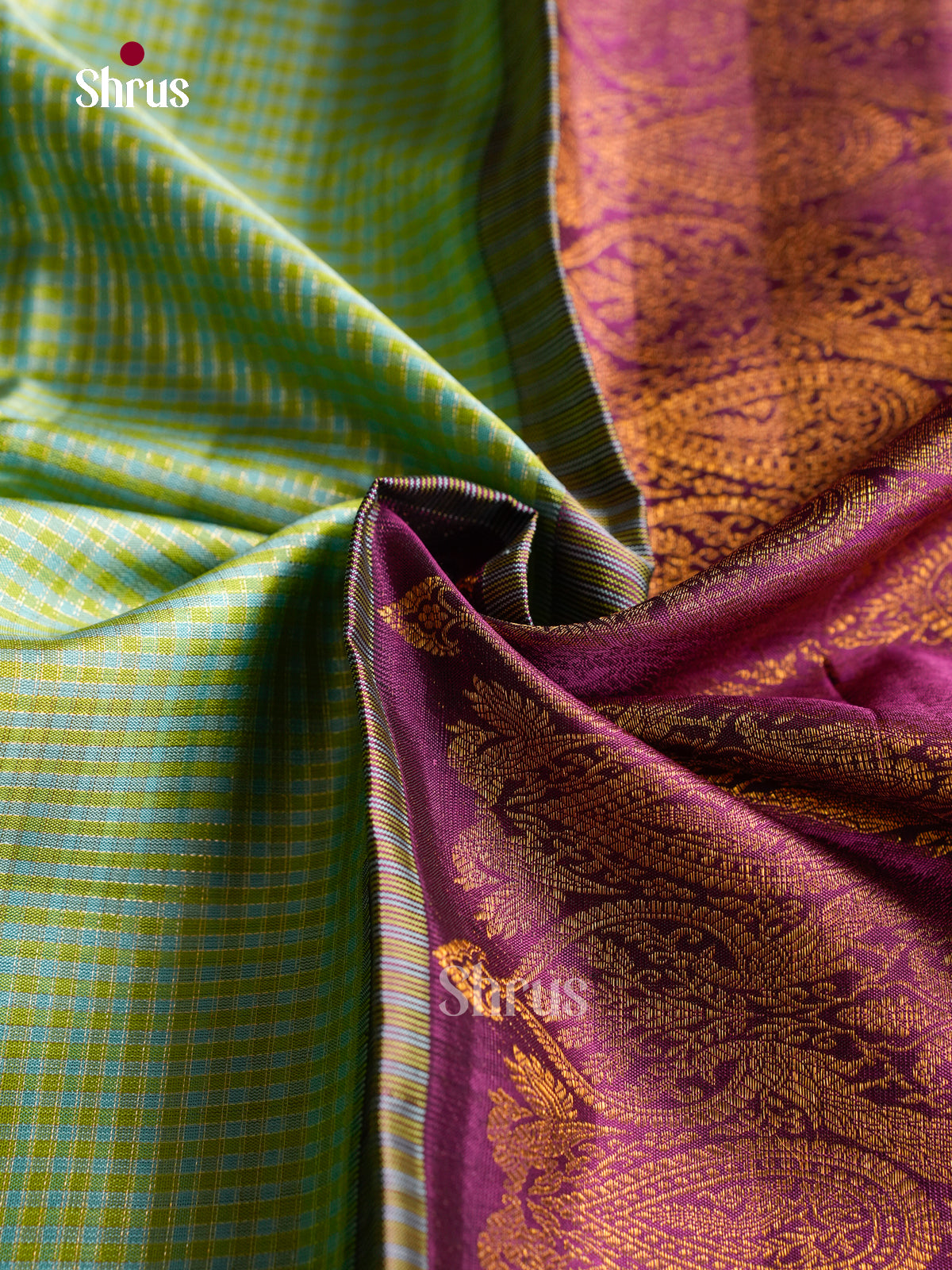 Chic Sea Green Kanchipuram Saree With Intricate Checks Patterns & Purple Border With Paisley Motifs