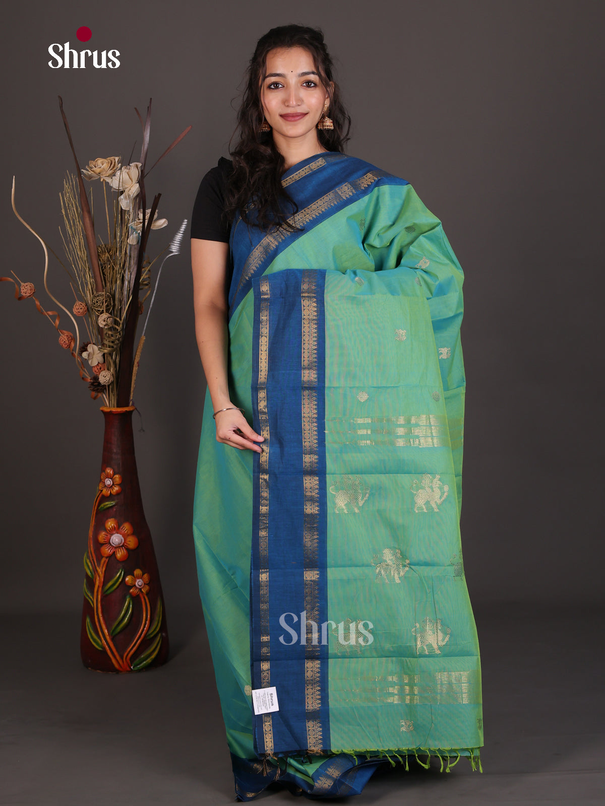 Chic Teal Green Chettinad Cotton Saree With Gold Buttas, Blue Border & Zari Pallu With Yazhi Motifs