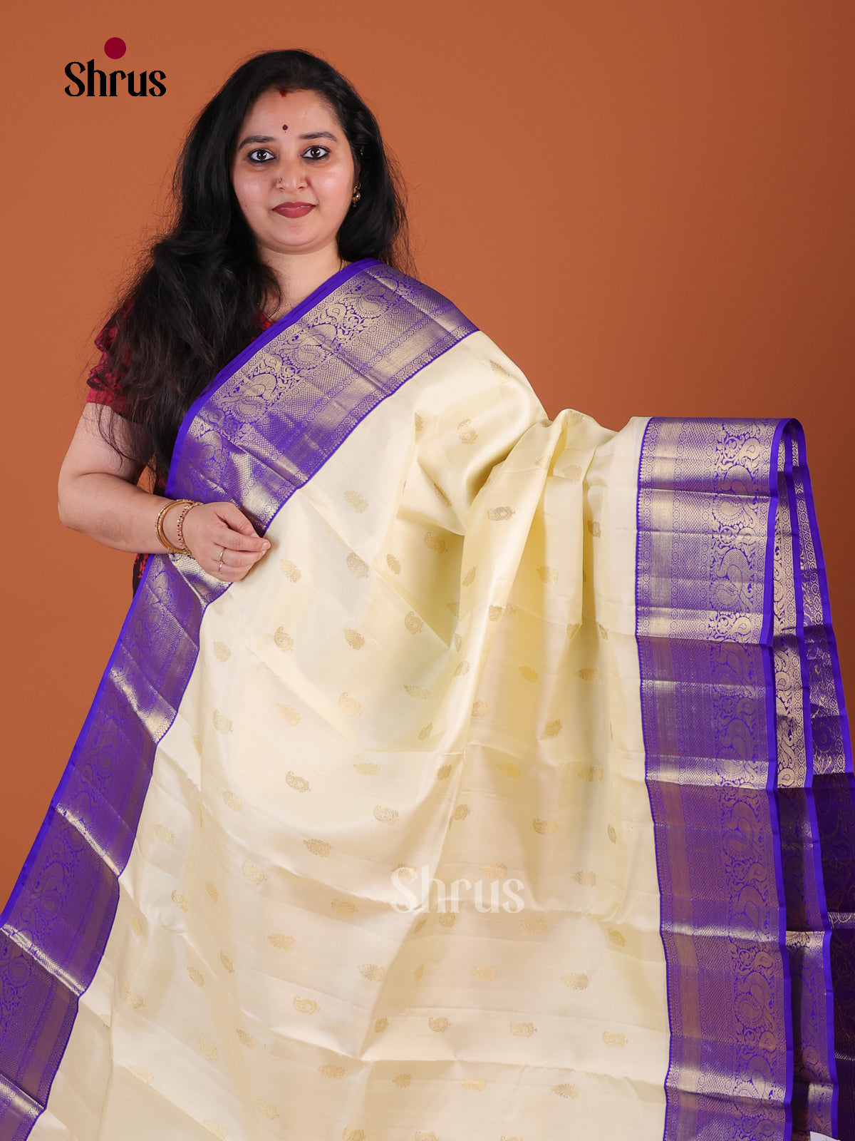 Classic Off White Kanchipuram Pattu Saree With Gold Buttas | Indigo Zari Border & Brocade Pallu