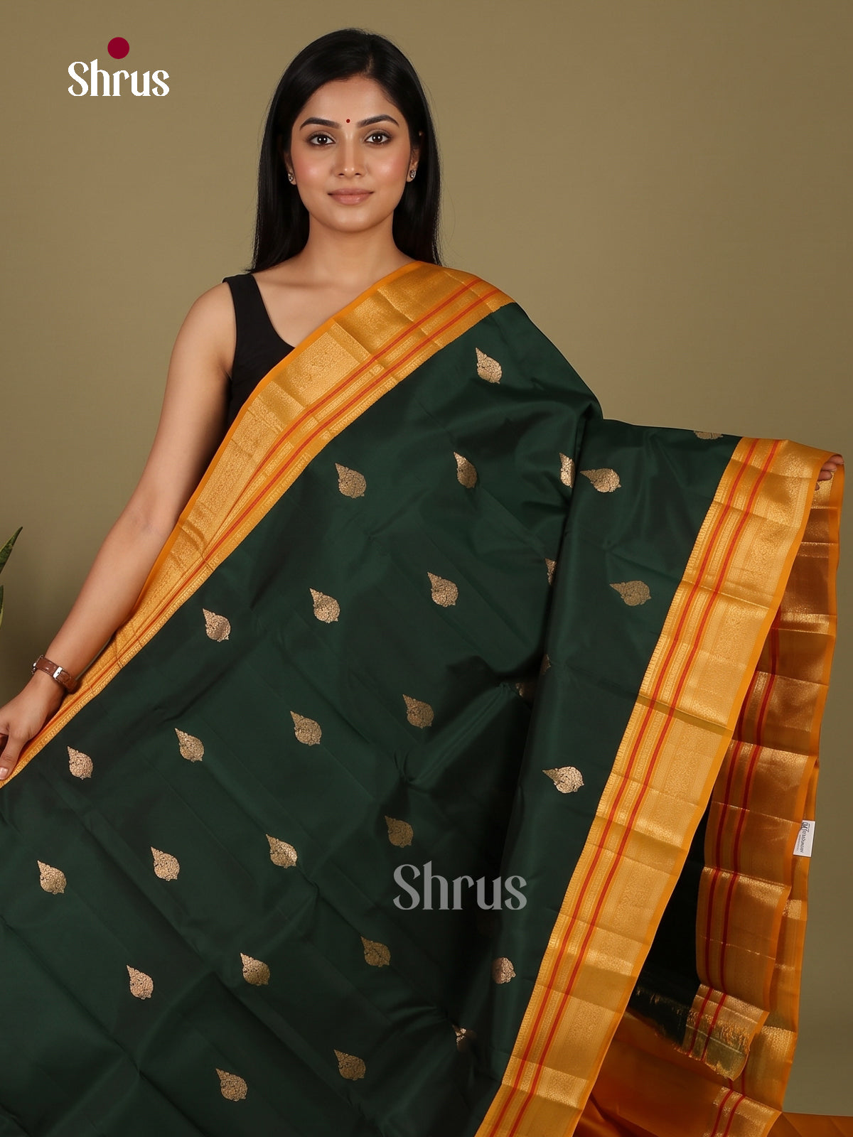 Classy Dark Green Kanchipuram Saree with Peacock Buttas & Mustard Zari Border 1