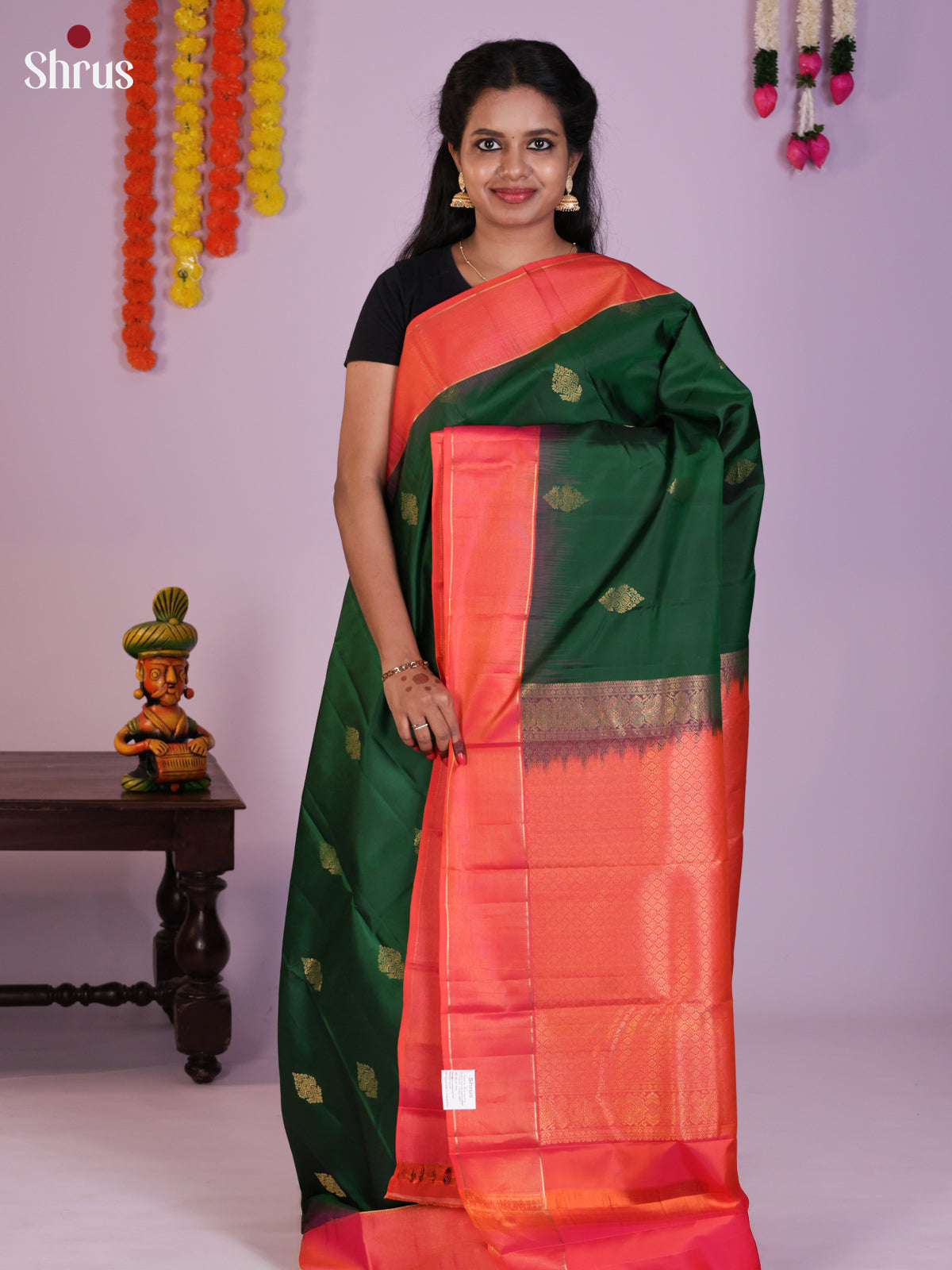 Classy Green Kanchipuram Silk Saree with Floral Motifs & Orangish Pink Zari Border & Pallu