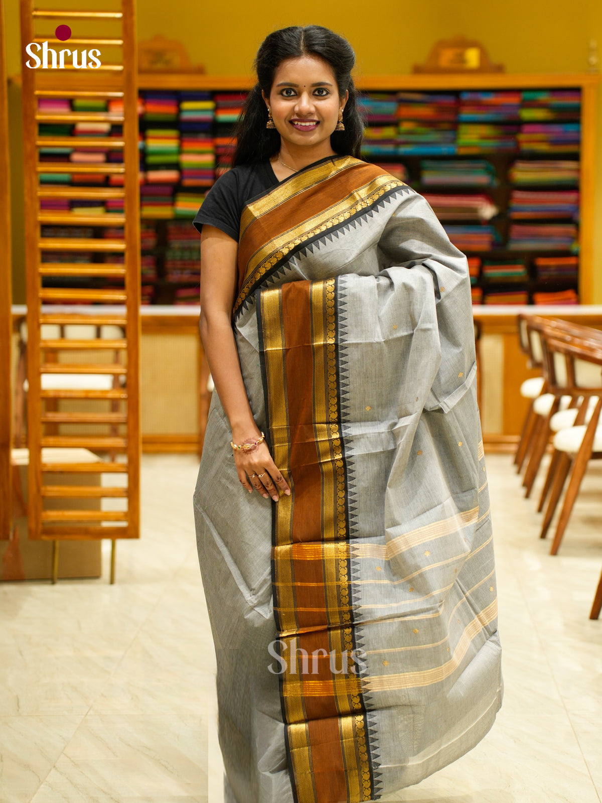 Classy Grey Chettinad Cotton Saree With Small Buttas & Black Rettapet Zari Border