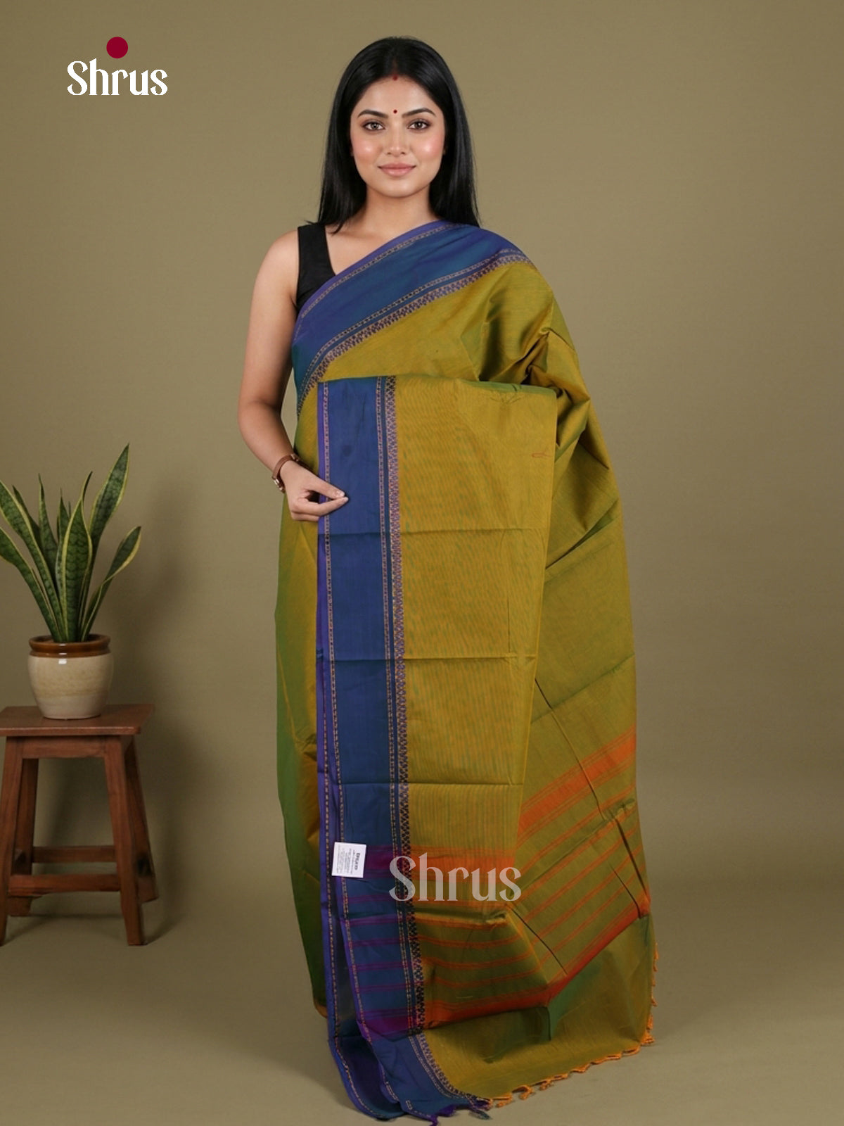 Classy Mustard Green Chettinad Cotton Saree With Plain Body & Blue Thread Woven Border
