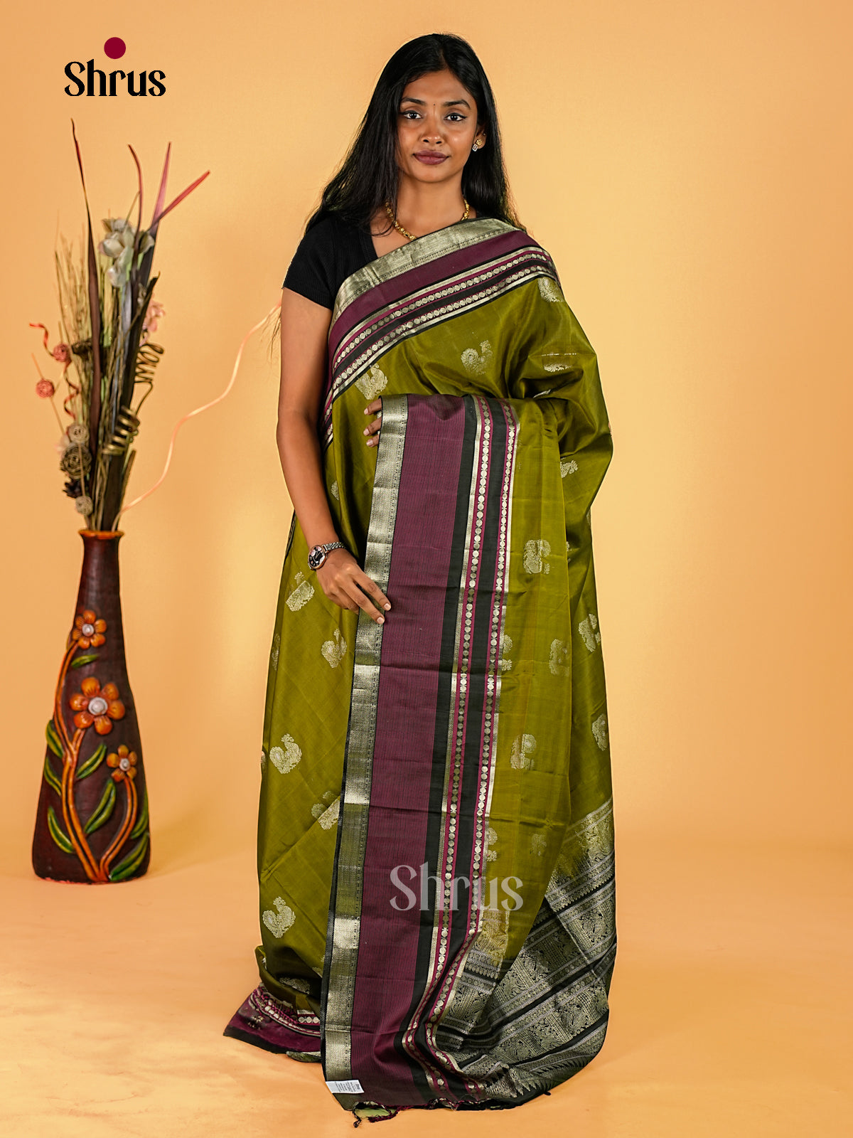 Classy Olive Green Soft Silk Sarees With Silver Peacock Buttas, Purple Border With Zari Bands & Traditonal Pallu