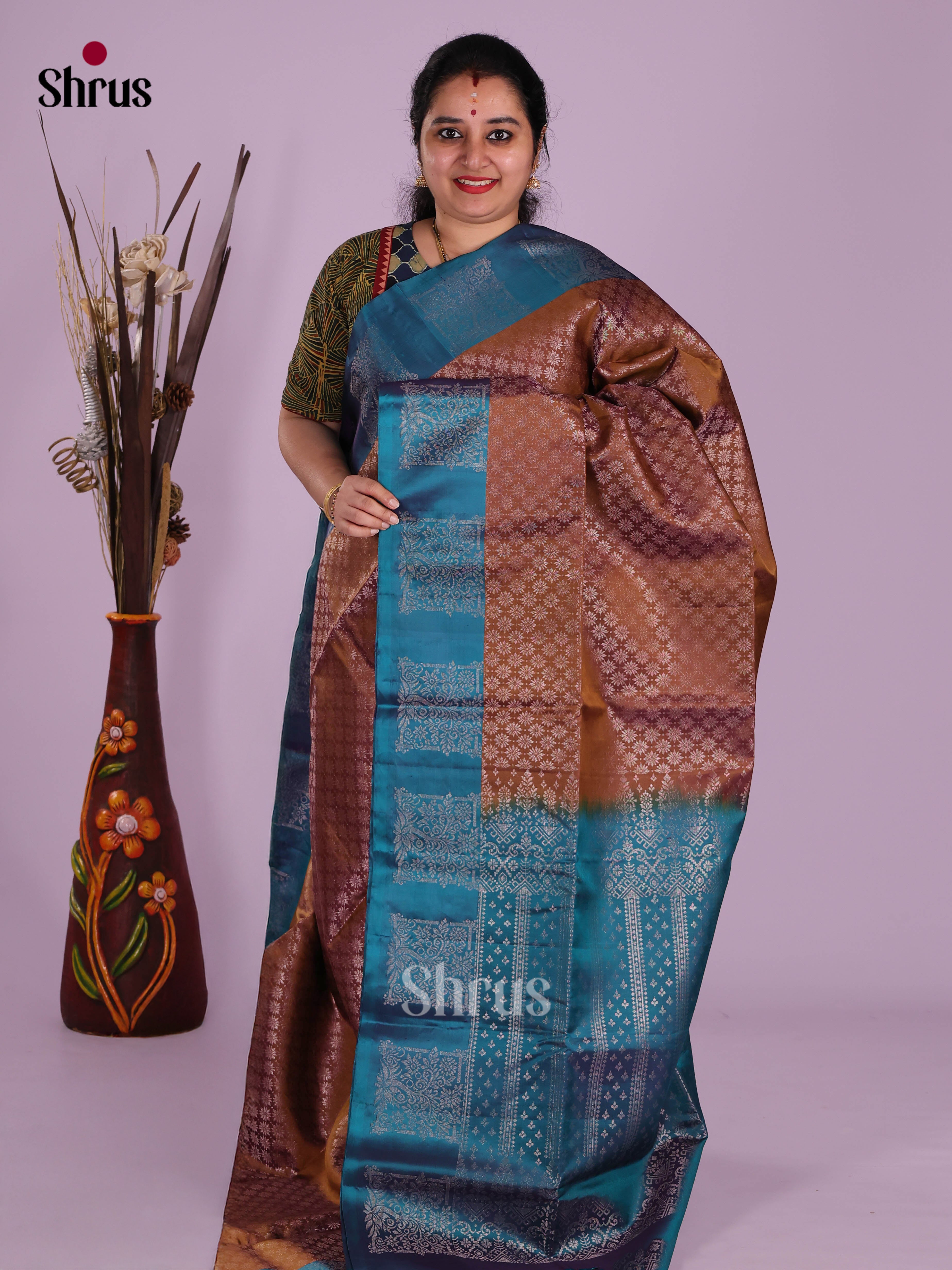 Buy Timeless Copper Soft Silk Saree With Intricately Woven Silver Zari Floral Buttis, Teal Border & Pallu