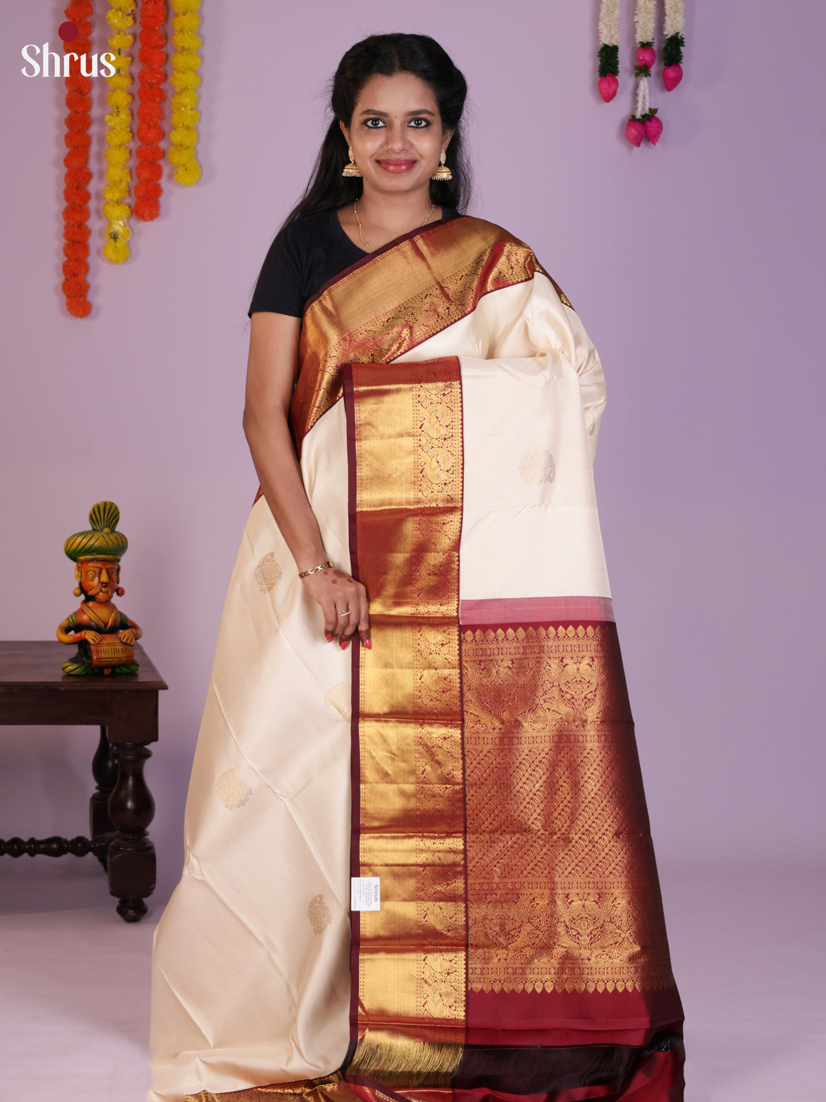 Buy Graceful Cream Kanchipuram Silk Saree With golden Medallions, Maroon Zari Border & Rich pallu